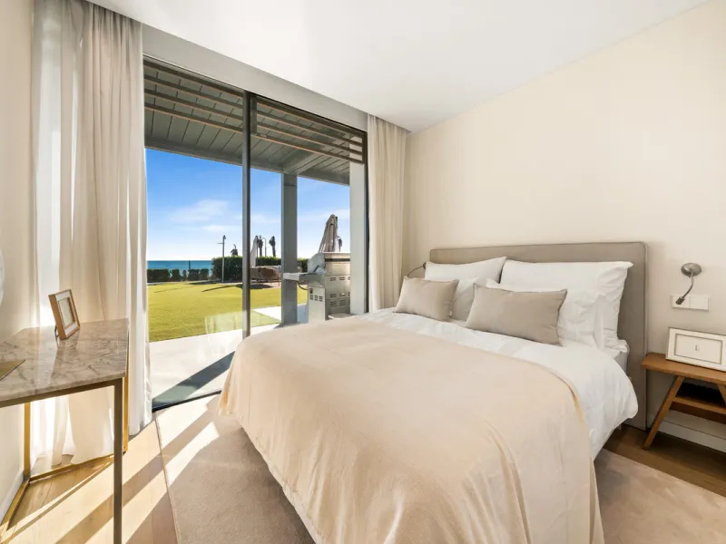 Boasting of panoramic sea views, a contemporary showpiece villa sitting in a privileged beachfront position in the New Golden Mile, surrounded by an expansive private garden with a large private swimming pool. The ideal family estate offering a dynamic ou