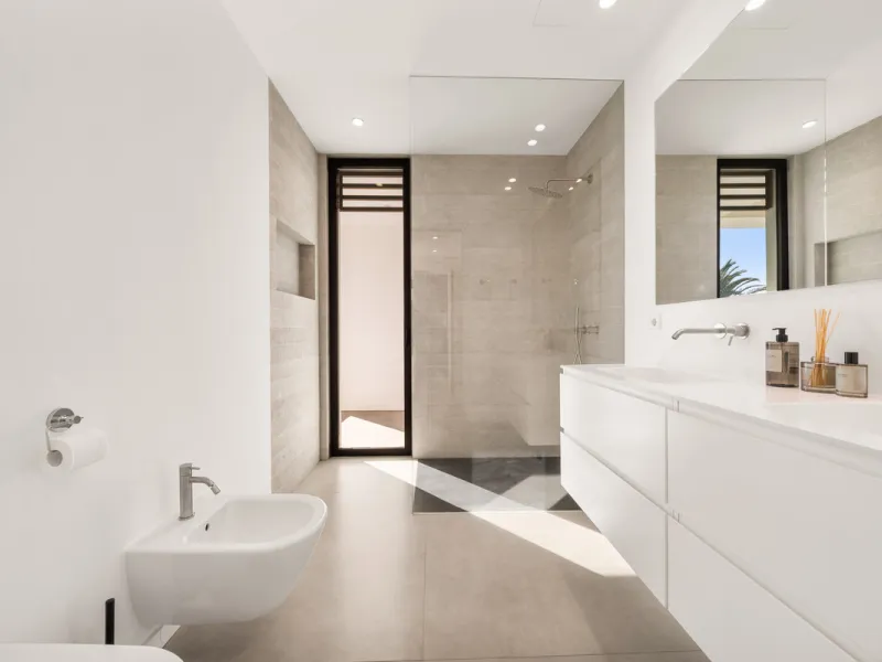 Boasting of panoramic sea views, a contemporary showpiece villa sitting in a privileged beachfront position in the New Golden Mile, surrounded by an expansive private garden with a large private swimming pool. The ideal family estate offering a dynamic ou