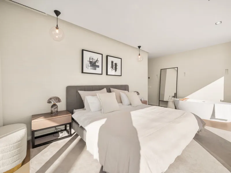 Boasting of panoramic sea views, a contemporary showpiece villa sitting in a privileged beachfront position in the New Golden Mile, surrounded by an expansive private garden with a large private swimming pool. The ideal family estate offering a dynamic ou