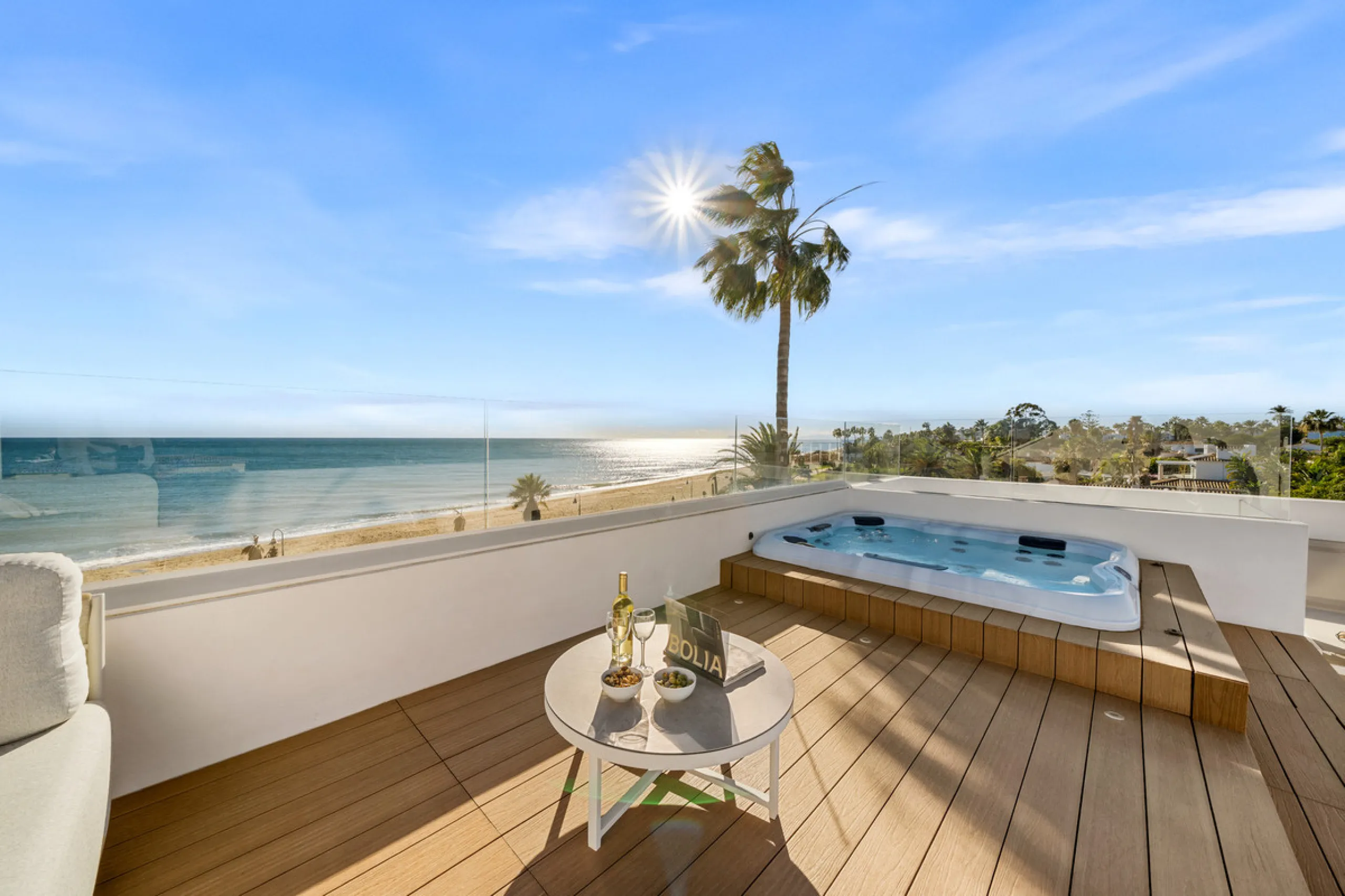Boasting of panoramic sea views, a contemporary showpiece villa sitting in a privileged beachfront position in the New Golden Mile, surrounded by an expansive private garden with a large private swimming pool. The ideal family estate offering a dynamic ou