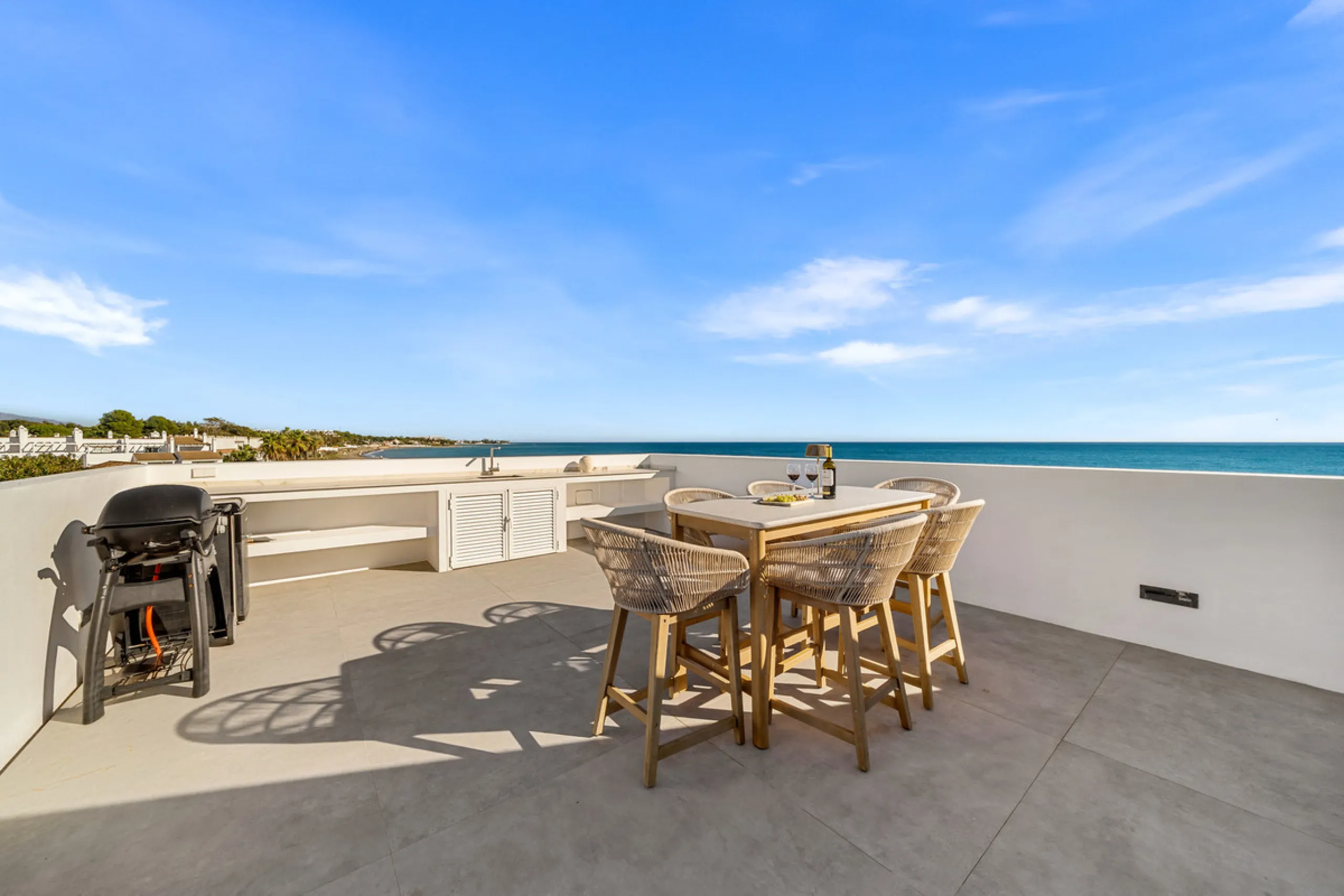 Boasting of panoramic sea views, a contemporary showpiece villa sitting in a privileged beachfront position in the New Golden Mile, surrounded by an expansive private garden with a large private swimming pool. The ideal family estate offering a dynamic ou
