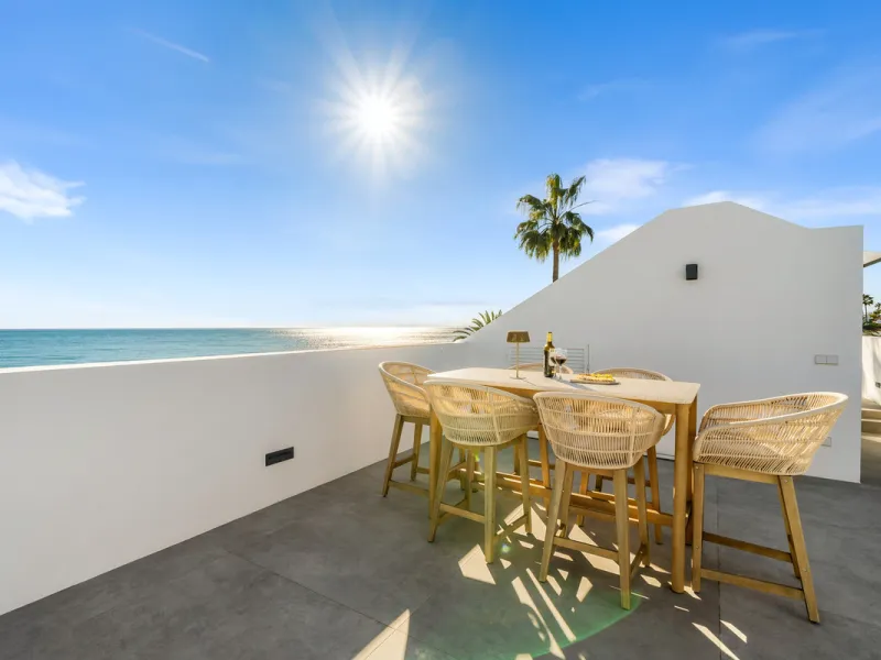 Boasting of panoramic sea views, a contemporary showpiece villa sitting in a privileged beachfront position in the New Golden Mile, surrounded by an expansive private garden with a large private swimming pool. The ideal family estate offering a dynamic ou