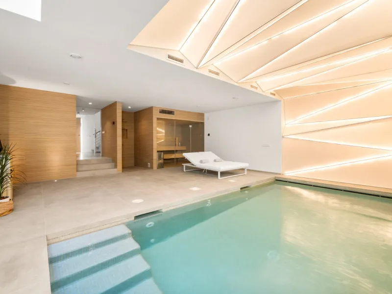 Boasting of panoramic sea views, a contemporary showpiece villa sitting in a privileged beachfront position in the New Golden Mile, surrounded by an expansive private garden with a large private swimming pool. The ideal family estate offering a dynamic ou