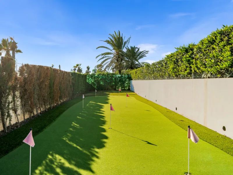 Boasting of panoramic sea views, a contemporary showpiece villa sitting in a privileged beachfront position in the New Golden Mile, surrounded by an expansive private garden with a large private swimming pool. The ideal family estate offering a dynamic ou