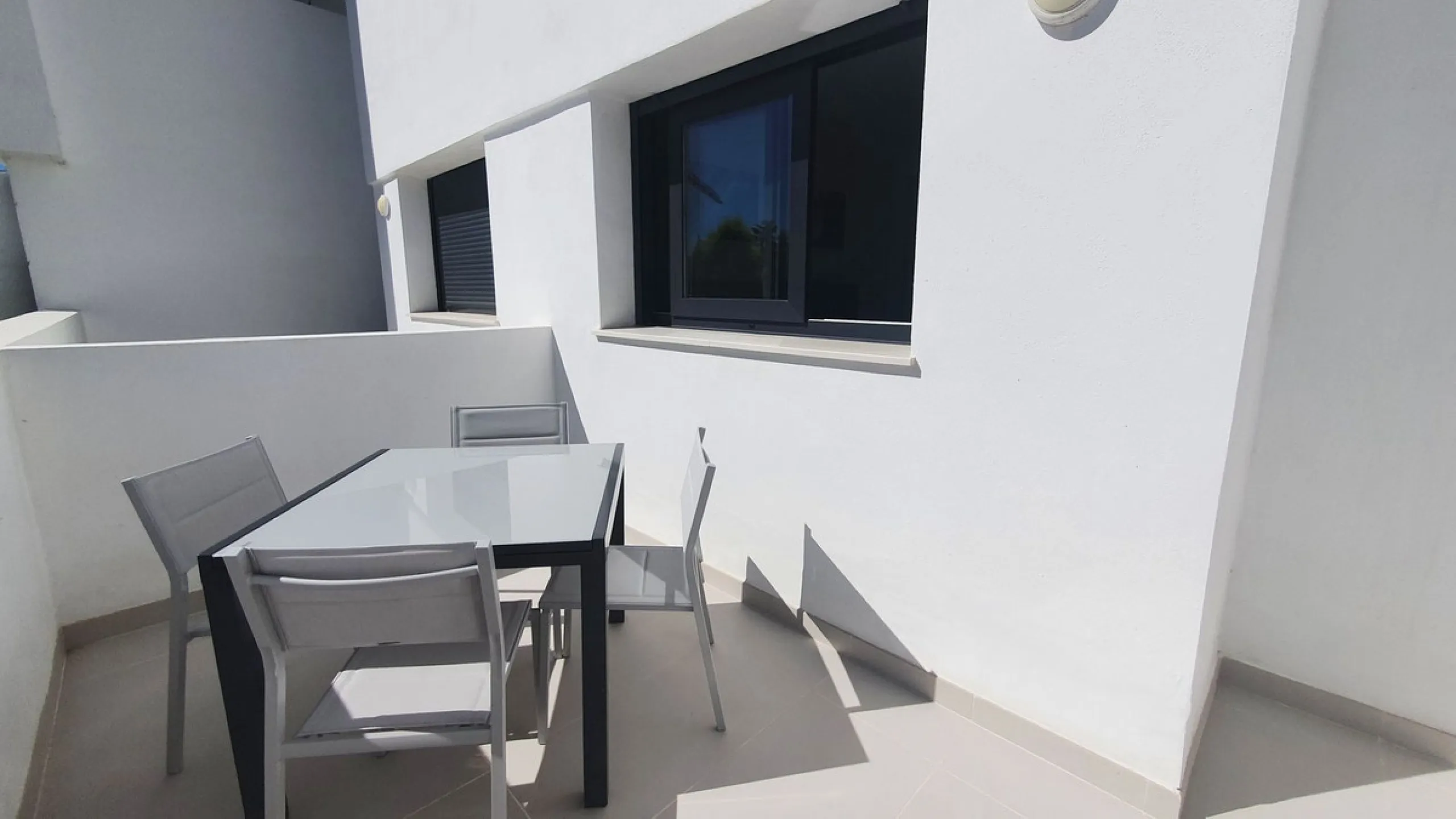 This stunning ground-floor apartment in Los Miradores del Sol Phase I perfectly combines contemporary luxury with Mediterranean indoor-outdoor living on Estepona's exclusive New Golden Mile. Offering 92 m² of elegant interior space and an impressive 84 m²