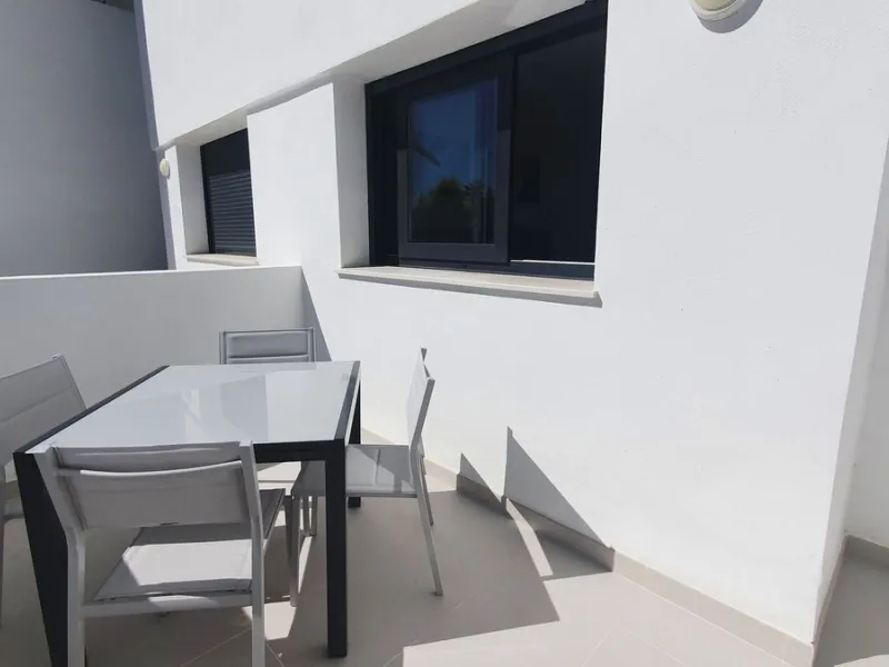 This stunning ground-floor apartment in Los Miradores del Sol Phase I perfectly combines contemporary luxury with Mediterranean indoor-outdoor living on Estepona's exclusive New Golden Mile. Offering 92 m² of elegant interior space and an impressive 84 m²