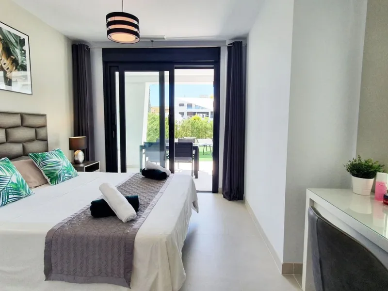 This stunning ground-floor apartment in Los Miradores del Sol Phase I perfectly combines contemporary luxury with Mediterranean indoor-outdoor living on Estepona's exclusive New Golden Mile. Offering 92 m² of elegant interior space and an impressive 84 m²