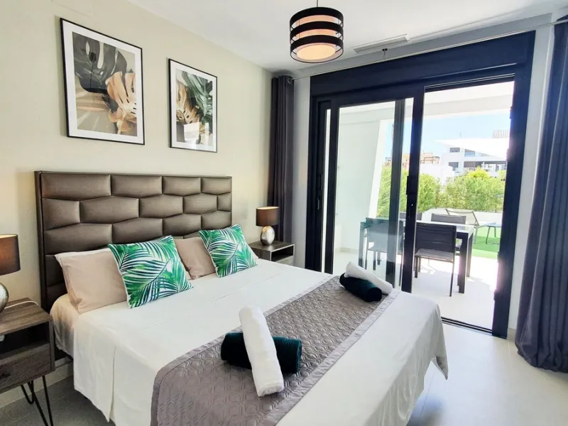 This stunning ground-floor apartment in Los Miradores del Sol Phase I perfectly combines contemporary luxury with Mediterranean indoor-outdoor living on Estepona's exclusive New Golden Mile. Offering 92 m² of elegant interior space and an impressive 84 m²