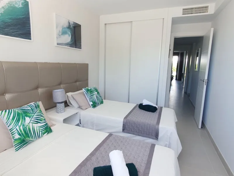 This stunning ground-floor apartment in Los Miradores del Sol Phase I perfectly combines contemporary luxury with Mediterranean indoor-outdoor living on Estepona's exclusive New Golden Mile. Offering 92 m² of elegant interior space and an impressive 84 m²