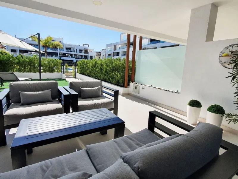 This stunning ground-floor apartment in Los Miradores del Sol Phase I perfectly combines contemporary luxury with Mediterranean indoor-outdoor living on Estepona's exclusive New Golden Mile. Offering 92 m² of elegant interior space and an impressive 84 m²