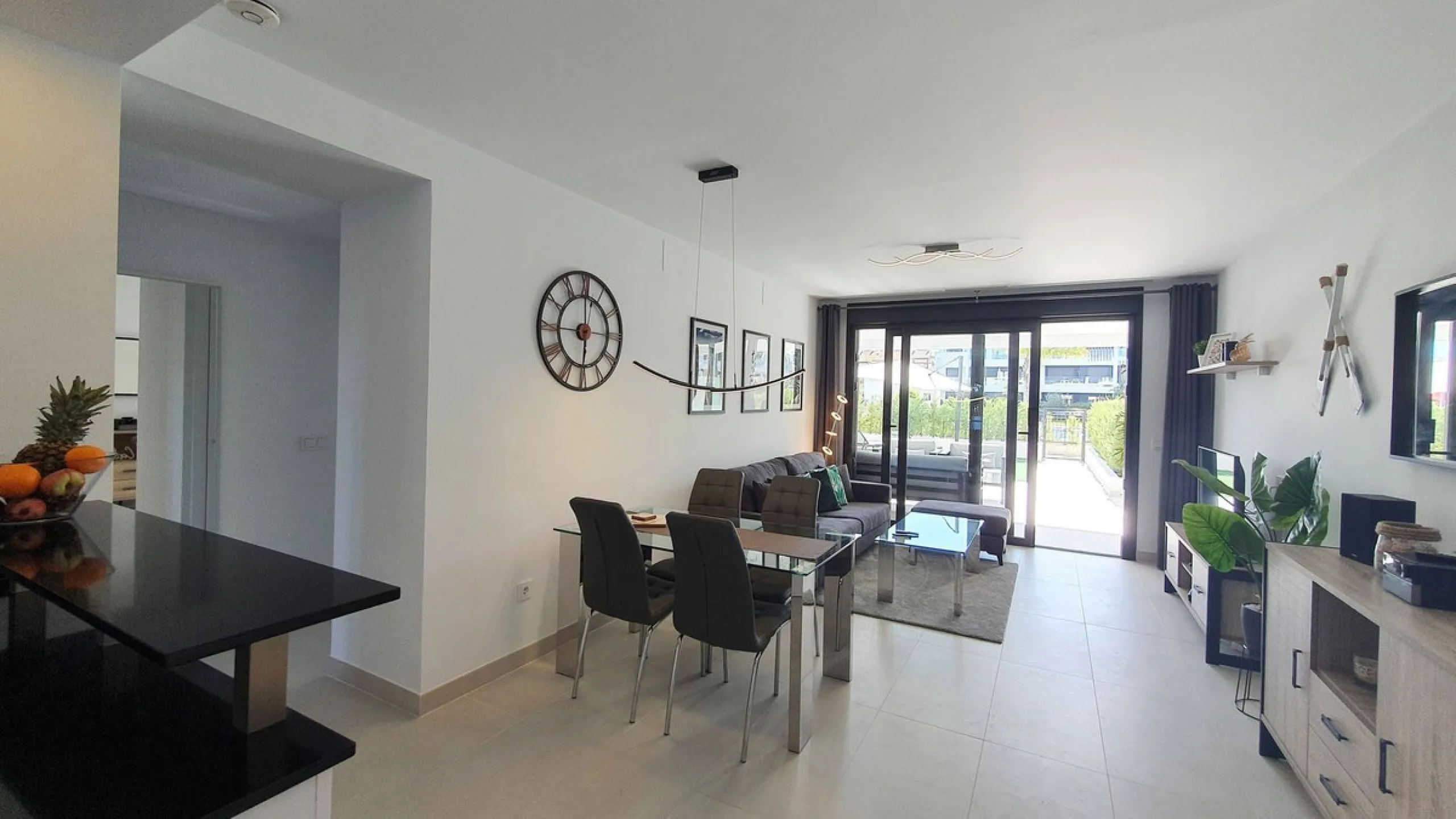 This stunning ground-floor apartment in Los Miradores del Sol Phase I perfectly combines contemporary luxury with Mediterranean indoor-outdoor living on Estepona's exclusive New Golden Mile. Offering 92 m² of elegant interior space and an impressive 84 m²