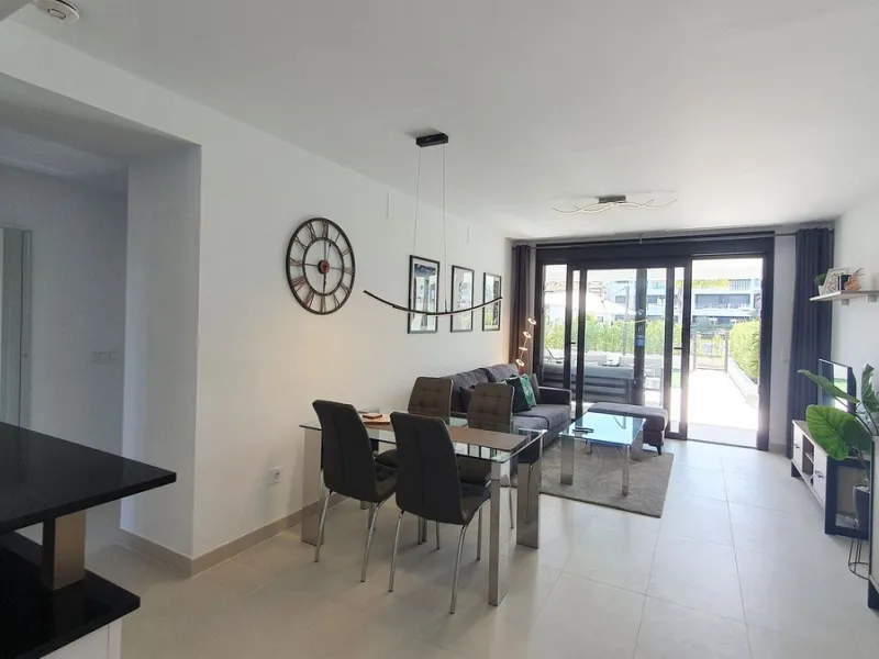 This stunning ground-floor apartment in Los Miradores del Sol Phase I perfectly combines contemporary luxury with Mediterranean indoor-outdoor living on Estepona's exclusive New Golden Mile. Offering 92 m² of elegant interior space and an impressive 84 m²