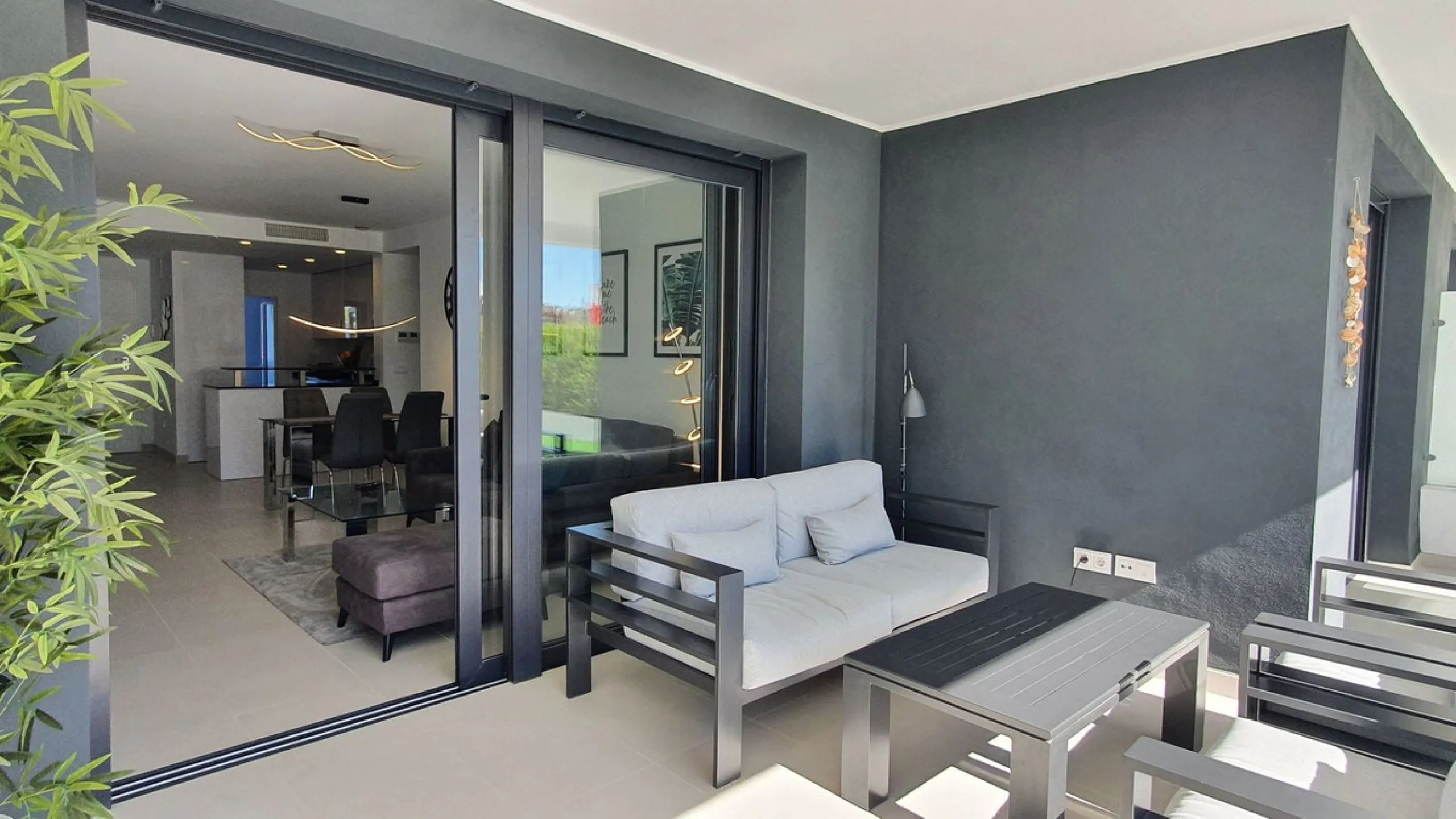 This stunning ground-floor apartment in Los Miradores del Sol Phase I perfectly combines contemporary luxury with Mediterranean indoor-outdoor living on Estepona's exclusive New Golden Mile. Offering 92 m² of elegant interior space and an impressive 84 m²