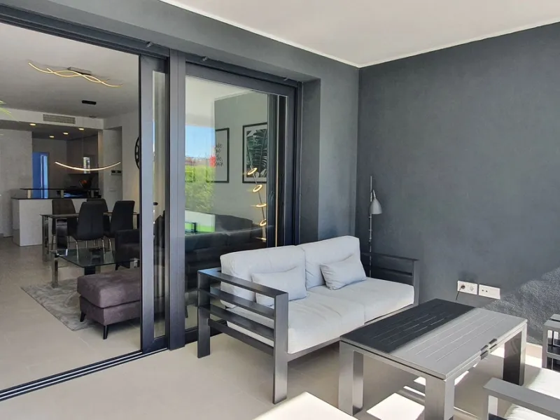 This stunning ground-floor apartment in Los Miradores del Sol Phase I perfectly combines contemporary luxury with Mediterranean indoor-outdoor living on Estepona's exclusive New Golden Mile. Offering 92 m² of elegant interior space and an impressive 84 m²