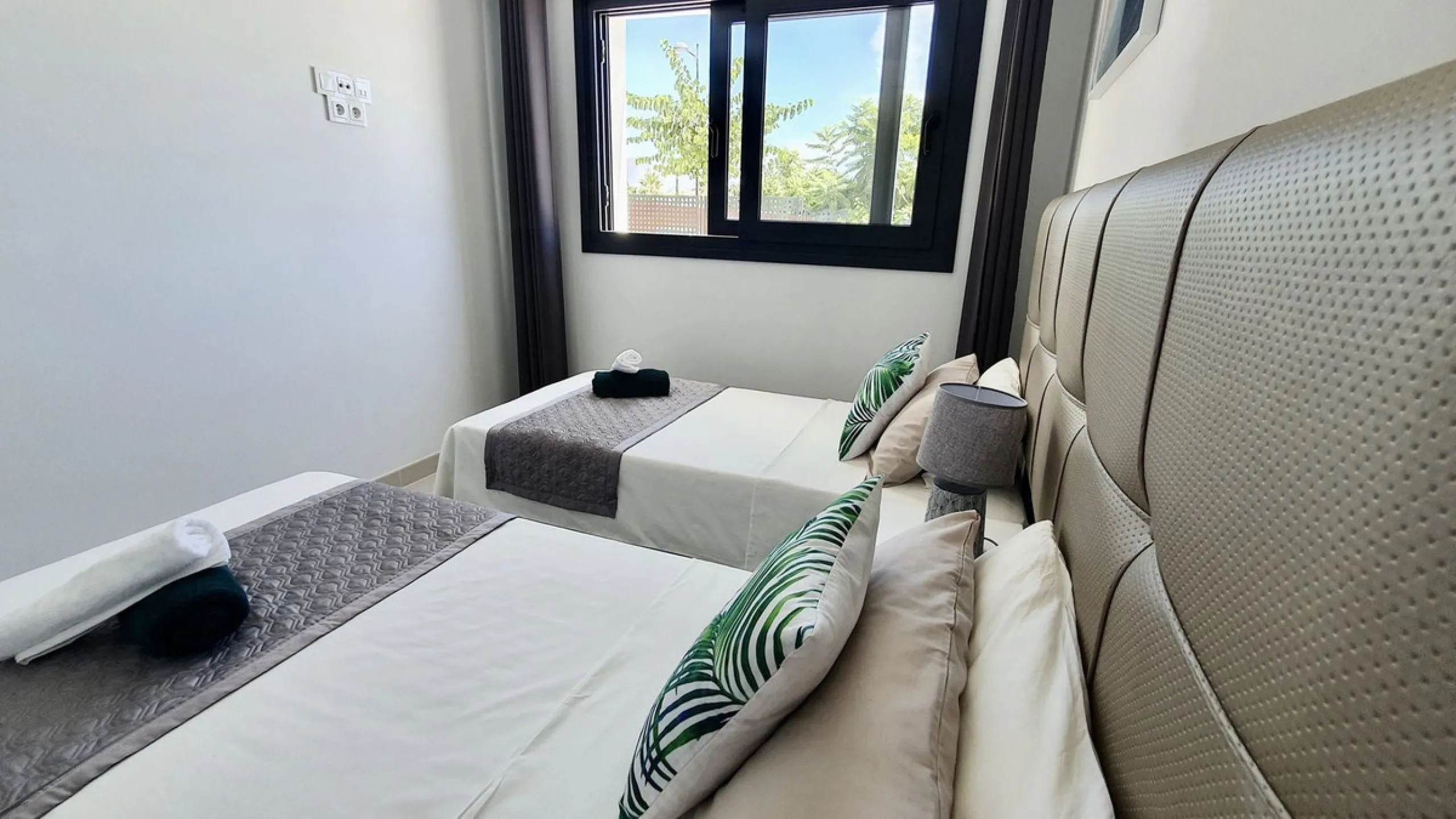 This stunning ground-floor apartment in Los Miradores del Sol Phase I perfectly combines contemporary luxury with Mediterranean indoor-outdoor living on Estepona's exclusive New Golden Mile. Offering 92 m² of elegant interior space and an impressive 84 m²