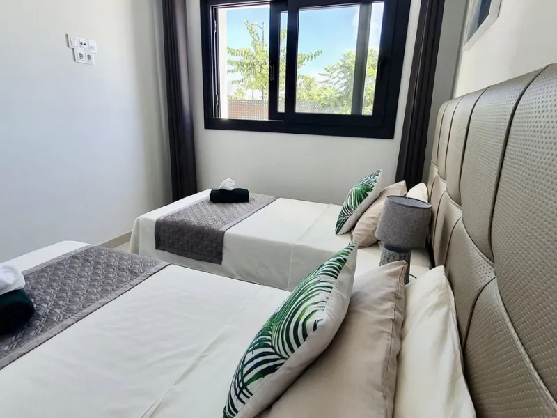 This stunning ground-floor apartment in Los Miradores del Sol Phase I perfectly combines contemporary luxury with Mediterranean indoor-outdoor living on Estepona's exclusive New Golden Mile. Offering 92 m² of elegant interior space and an impressive 84 m²