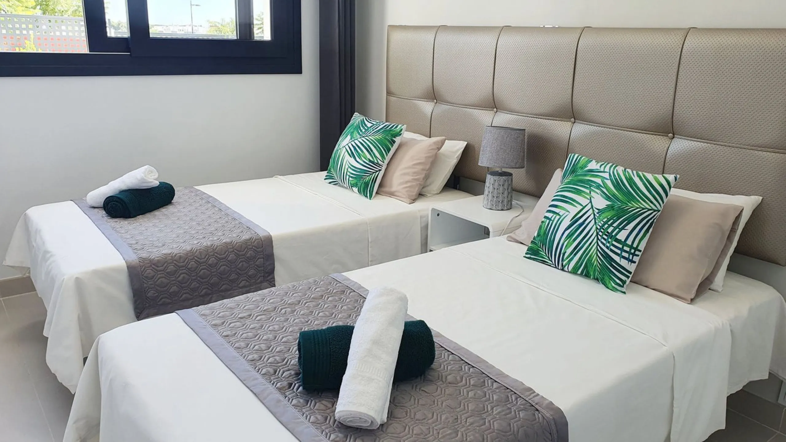 This stunning ground-floor apartment in Los Miradores del Sol Phase I perfectly combines contemporary luxury with Mediterranean indoor-outdoor living on Estepona's exclusive New Golden Mile. Offering 92 m² of elegant interior space and an impressive 84 m²