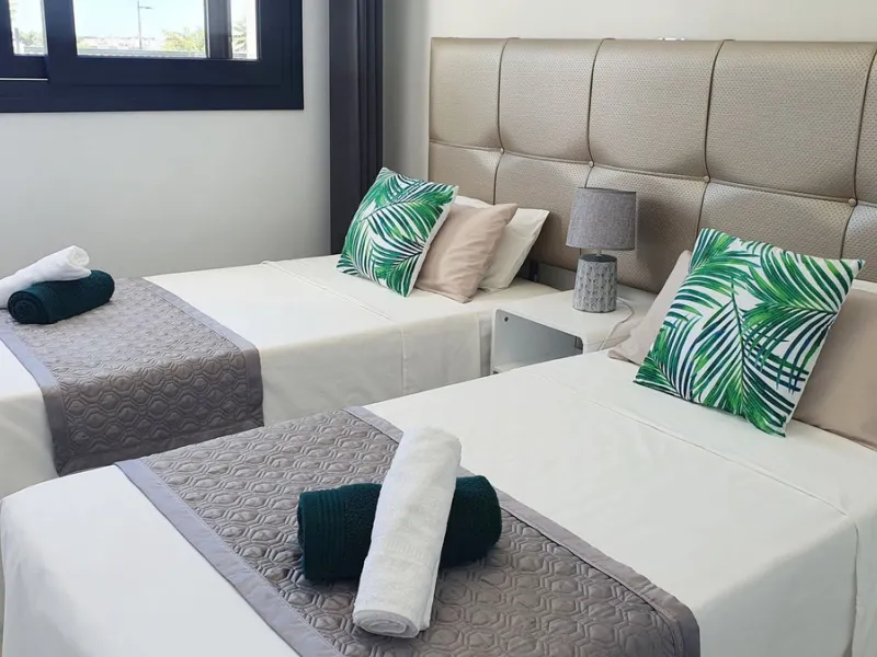 This stunning ground-floor apartment in Los Miradores del Sol Phase I perfectly combines contemporary luxury with Mediterranean indoor-outdoor living on Estepona's exclusive New Golden Mile. Offering 92 m² of elegant interior space and an impressive 84 m²