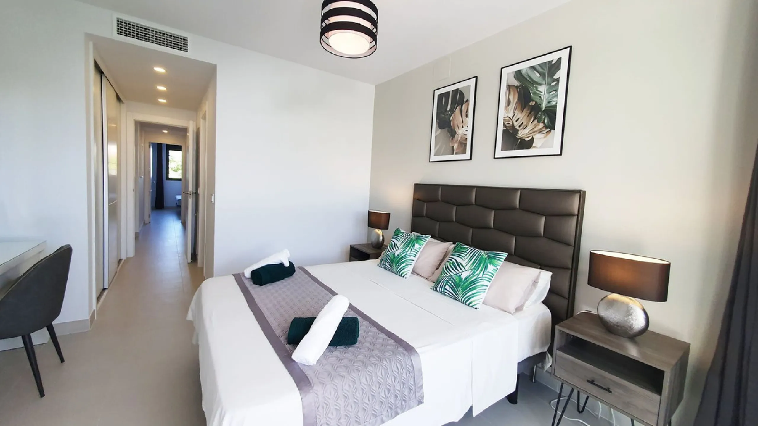 This stunning ground-floor apartment in Los Miradores del Sol Phase I perfectly combines contemporary luxury with Mediterranean indoor-outdoor living on Estepona's exclusive New Golden Mile. Offering 92 m² of elegant interior space and an impressive 84 m²