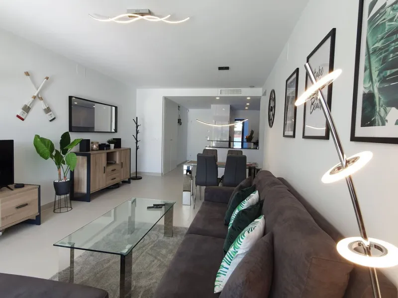This stunning ground-floor apartment in Los Miradores del Sol Phase I perfectly combines contemporary luxury with Mediterranean indoor-outdoor living on Estepona's exclusive New Golden Mile. Offering 92 m² of elegant interior space and an impressive 84 m²
