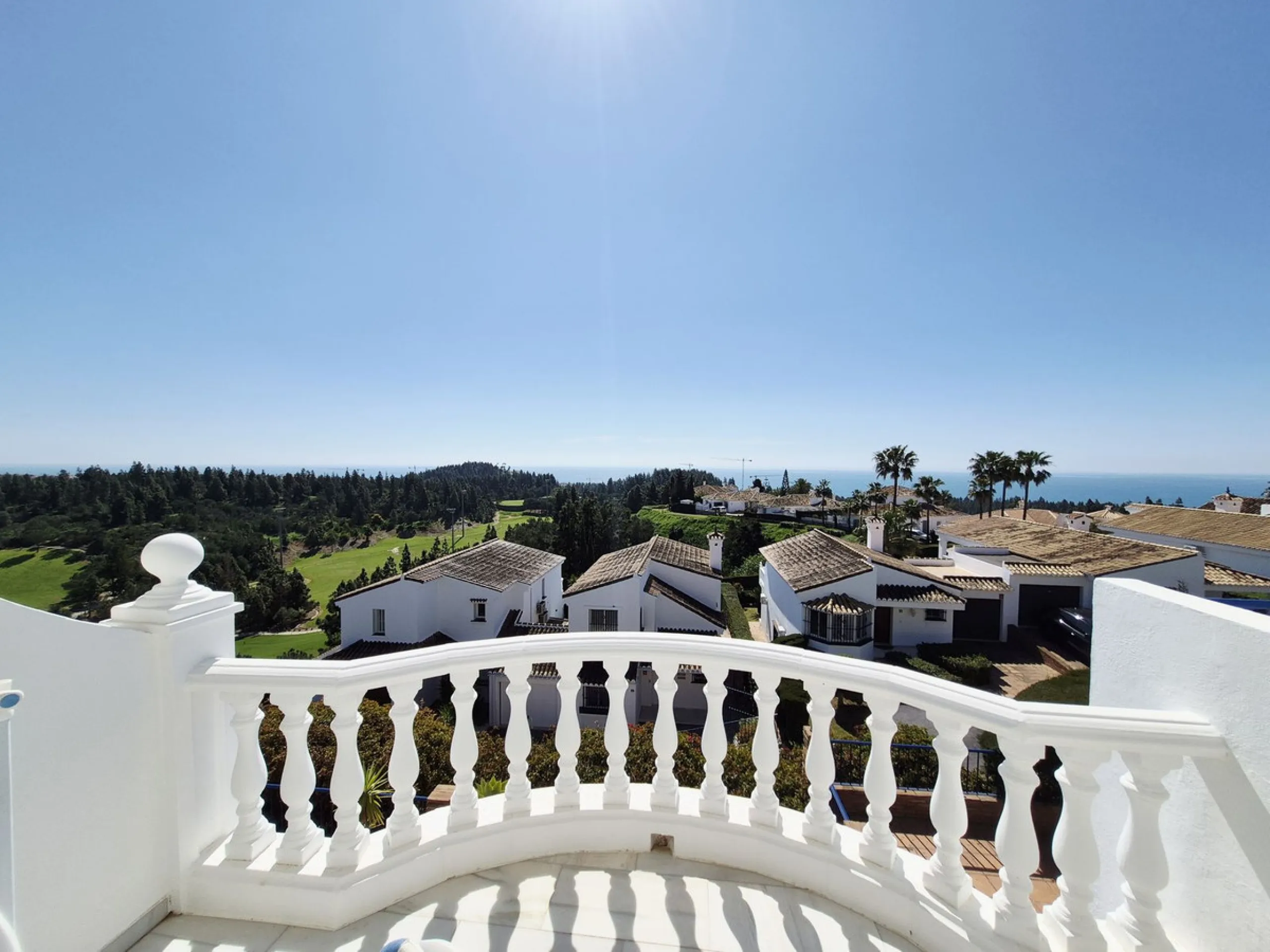 INCREDIBLE PANORAMIC VIEWS FROM THIS BRIGHT AND SPACIOUS APARTMENT WHICH LOOKS OUT OVER THE BAY OF LA CALA  AND EL CHAPARRAL GOLF COURSE.