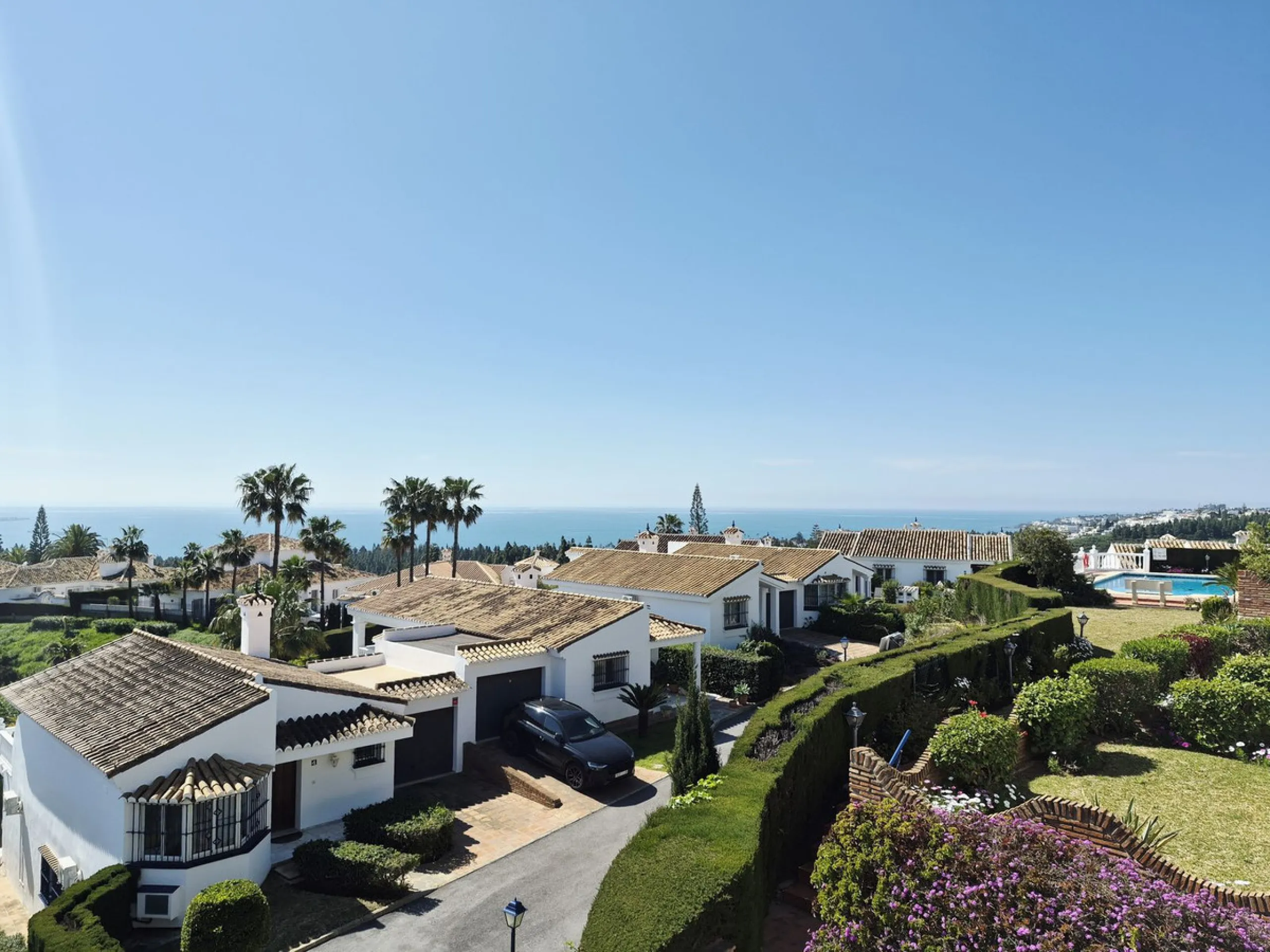 INCREDIBLE PANORAMIC VIEWS FROM THIS BRIGHT AND SPACIOUS APARTMENT WHICH LOOKS OUT OVER THE BAY OF LA CALA  AND EL CHAPARRAL GOLF COURSE.