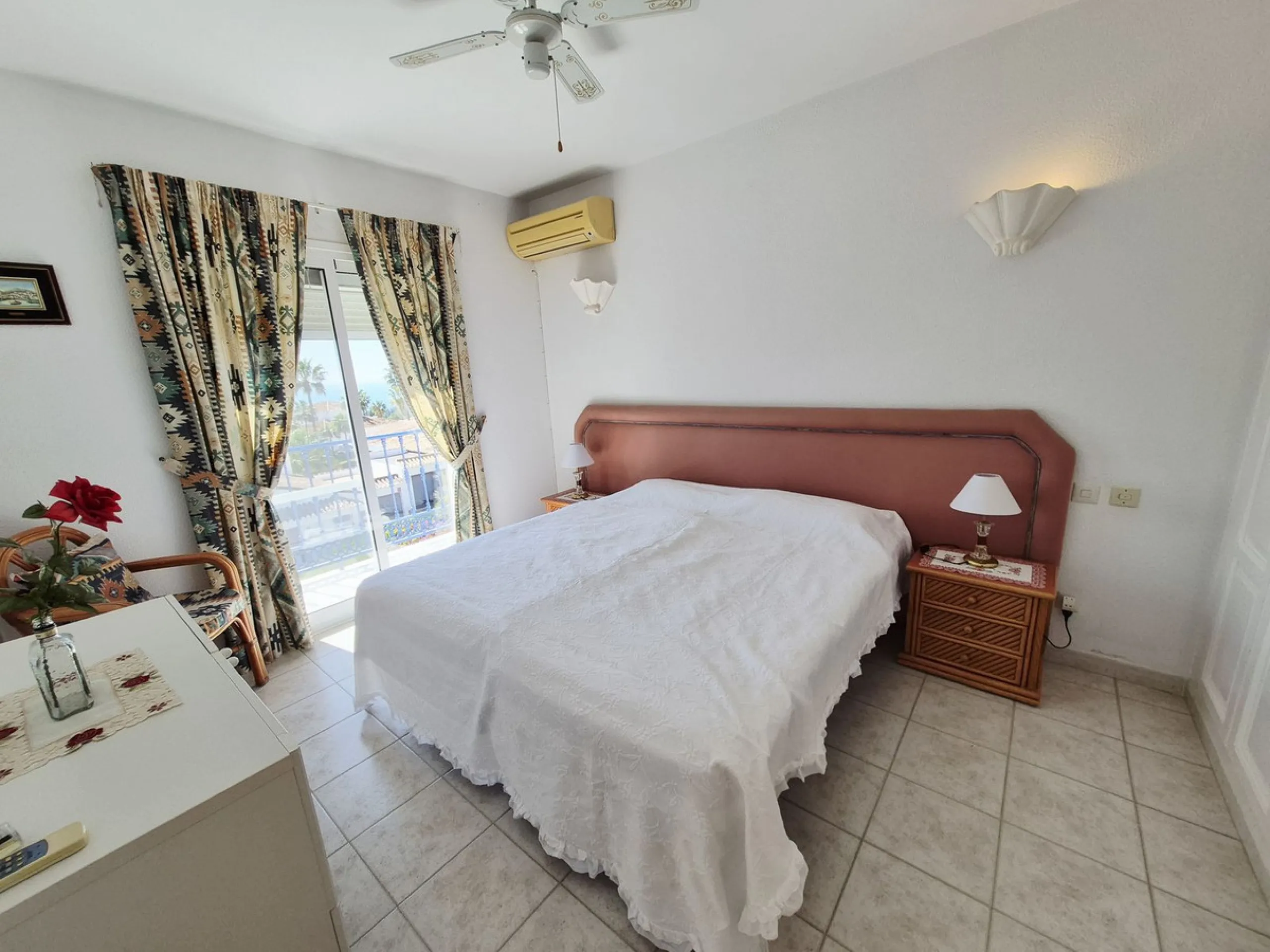 INCREDIBLE PANORAMIC VIEWS FROM THIS BRIGHT AND SPACIOUS APARTMENT WHICH LOOKS OUT OVER THE BAY OF LA CALA  AND EL CHAPARRAL GOLF COURSE.