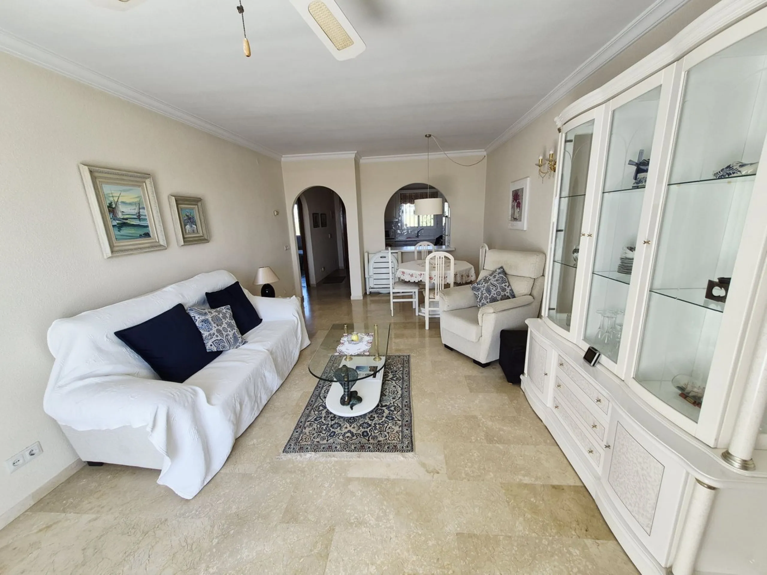 INCREDIBLE PANORAMIC VIEWS FROM THIS BRIGHT AND SPACIOUS APARTMENT WHICH LOOKS OUT OVER THE BAY OF LA CALA  AND EL CHAPARRAL GOLF COURSE.