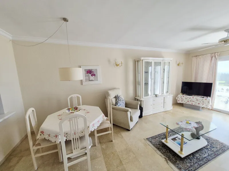 INCREDIBLE PANORAMIC VIEWS FROM THIS BRIGHT AND SPACIOUS APARTMENT WHICH LOOKS OUT OVER THE BAY OF LA CALA  AND EL CHAPARRAL GOLF COURSE.