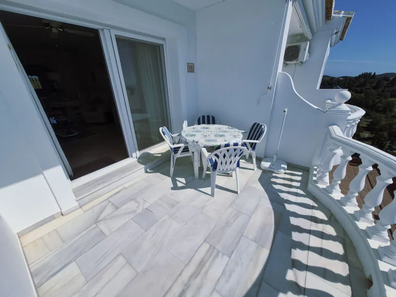 INCREDIBLE PANORAMIC VIEWS FROM THIS BRIGHT AND SPACIOUS APARTMENT WHICH LOOKS OUT OVER THE BAY OF LA CALA  AND EL CHAPARRAL GOLF COURSE.