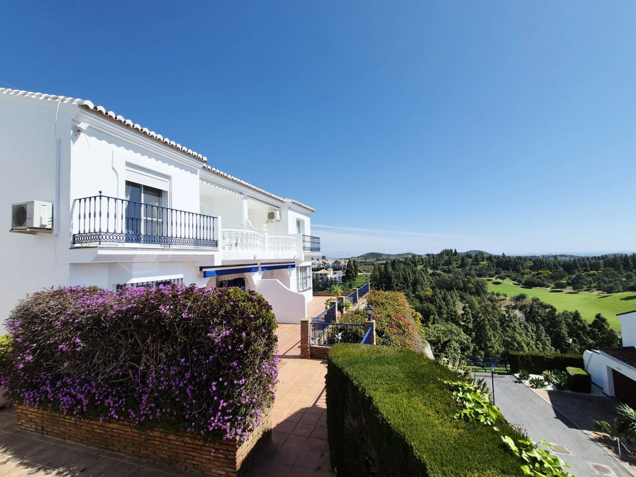 INCREDIBLE PANORAMIC VIEWS FROM THIS BRIGHT AND SPACIOUS APARTMENT WHICH LOOKS OUT OVER THE BAY OF LA CALA  AND EL CHAPARRAL GOLF COURSE.