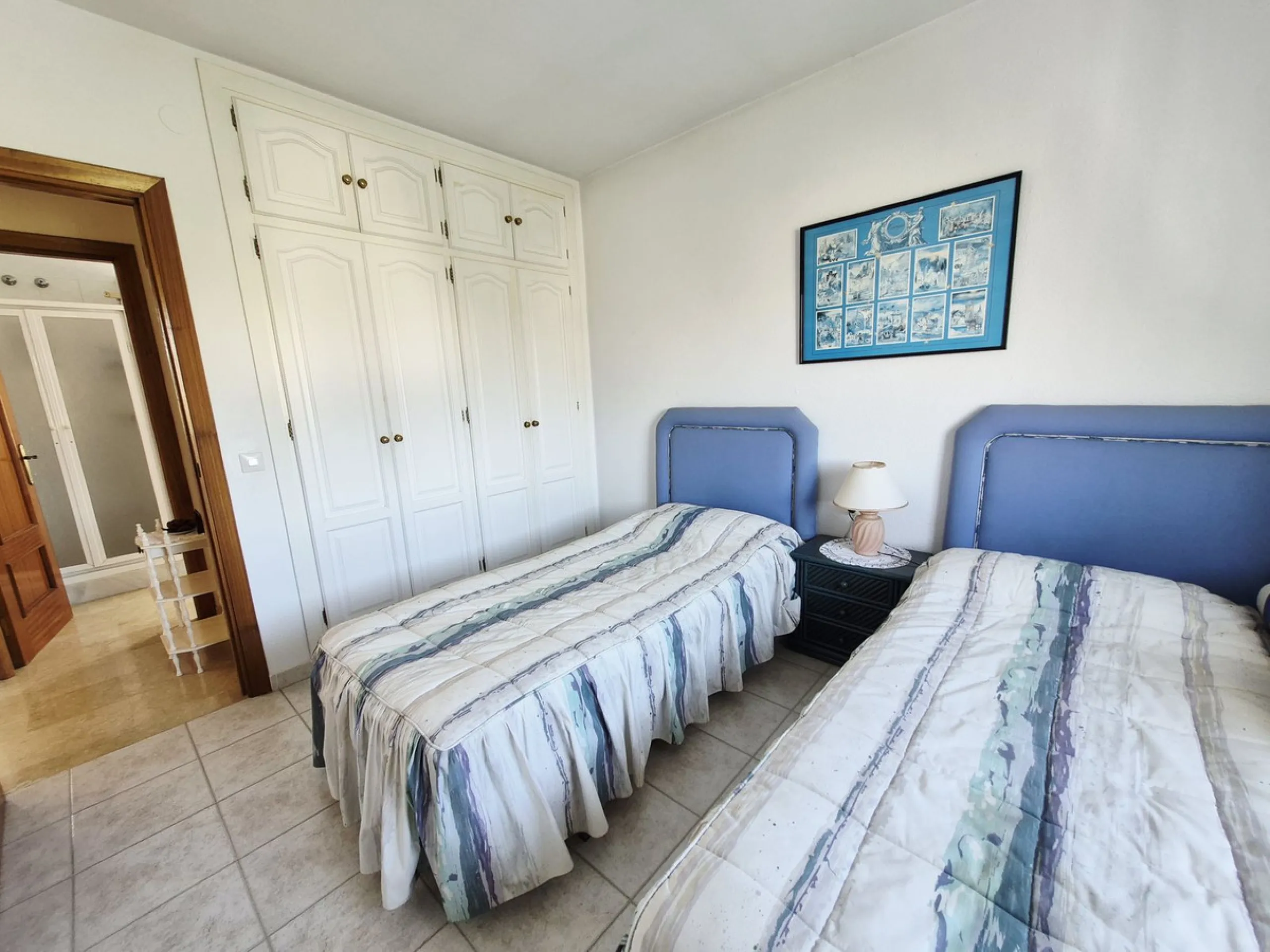 INCREDIBLE PANORAMIC VIEWS FROM THIS BRIGHT AND SPACIOUS APARTMENT WHICH LOOKS OUT OVER THE BAY OF LA CALA  AND EL CHAPARRAL GOLF COURSE.