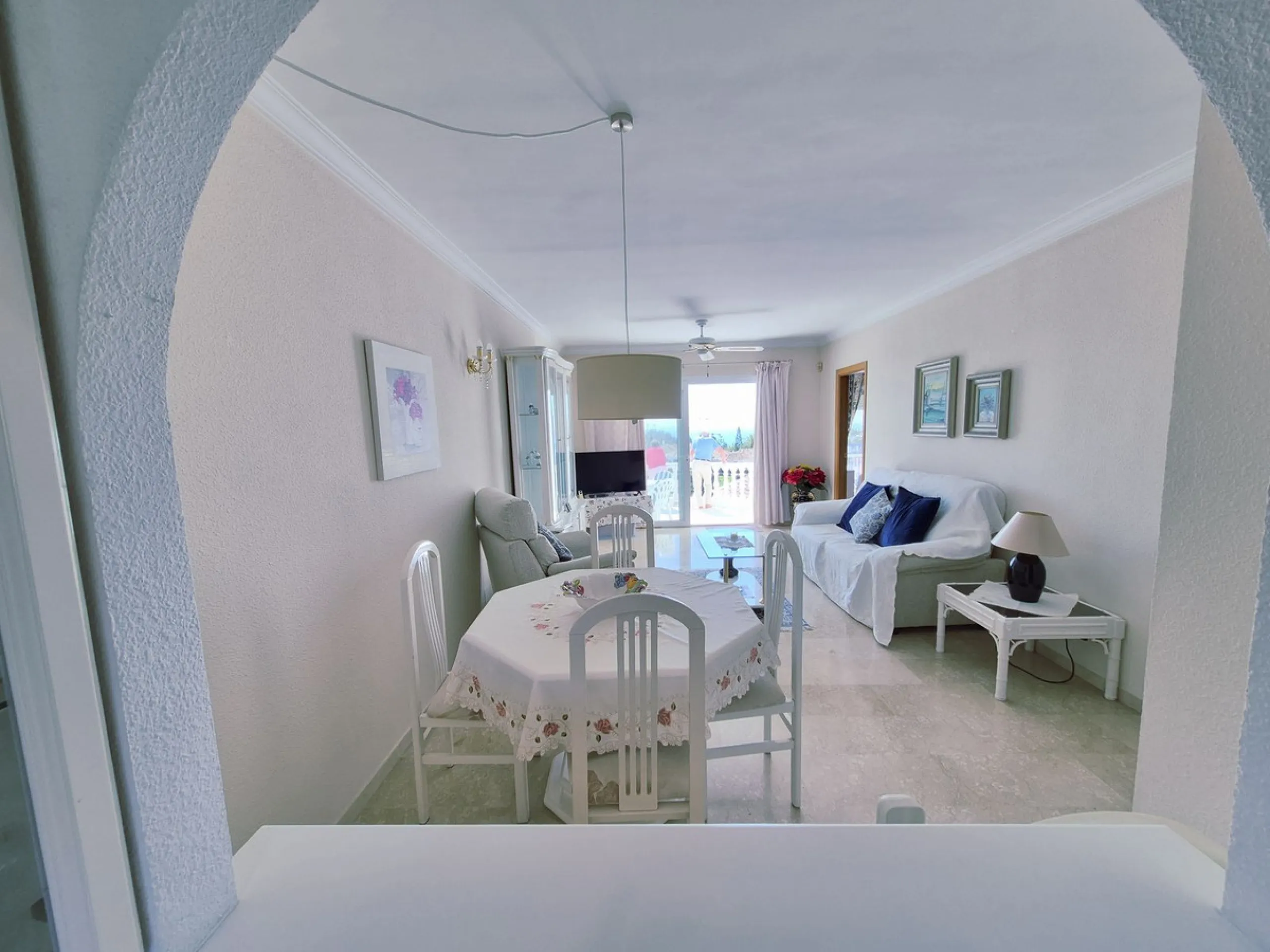 INCREDIBLE PANORAMIC VIEWS FROM THIS BRIGHT AND SPACIOUS APARTMENT WHICH LOOKS OUT OVER THE BAY OF LA CALA  AND EL CHAPARRAL GOLF COURSE.