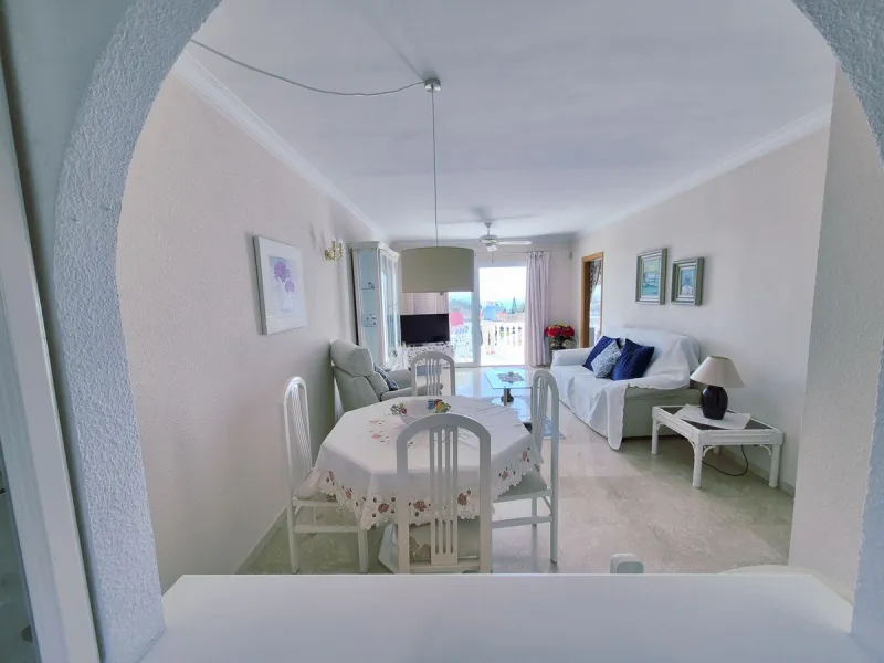 INCREDIBLE PANORAMIC VIEWS FROM THIS BRIGHT AND SPACIOUS APARTMENT WHICH LOOKS OUT OVER THE BAY OF LA CALA  AND EL CHAPARRAL GOLF COURSE.