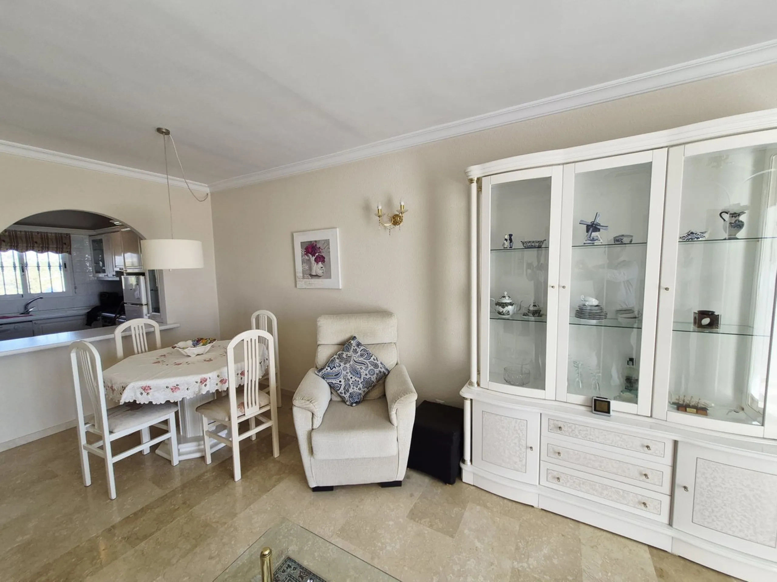 INCREDIBLE PANORAMIC VIEWS FROM THIS BRIGHT AND SPACIOUS APARTMENT WHICH LOOKS OUT OVER THE BAY OF LA CALA  AND EL CHAPARRAL GOLF COURSE.