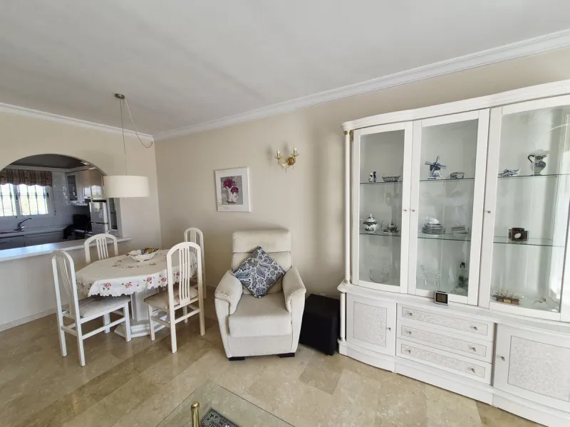 INCREDIBLE PANORAMIC VIEWS FROM THIS BRIGHT AND SPACIOUS APARTMENT WHICH LOOKS OUT OVER THE BAY OF LA CALA  AND EL CHAPARRAL GOLF COURSE.