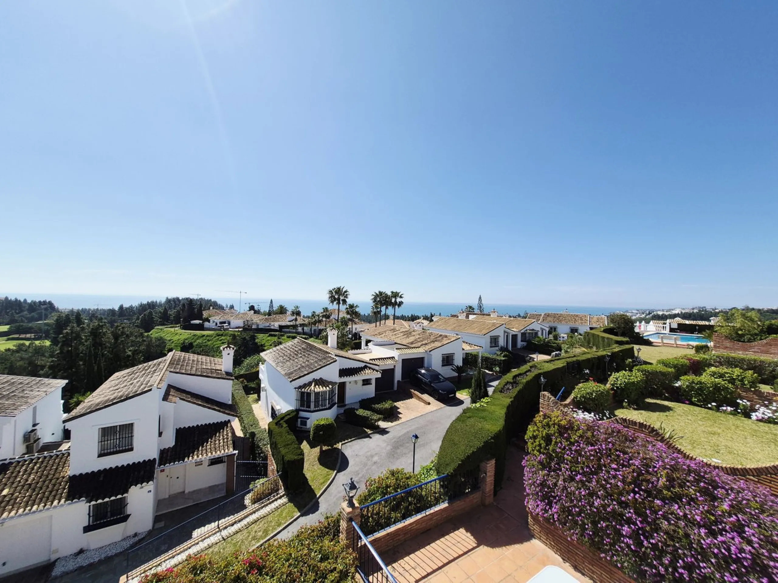 INCREDIBLE PANORAMIC VIEWS FROM THIS BRIGHT AND SPACIOUS APARTMENT WHICH LOOKS OUT OVER THE BAY OF LA CALA  AND EL CHAPARRAL GOLF COURSE.