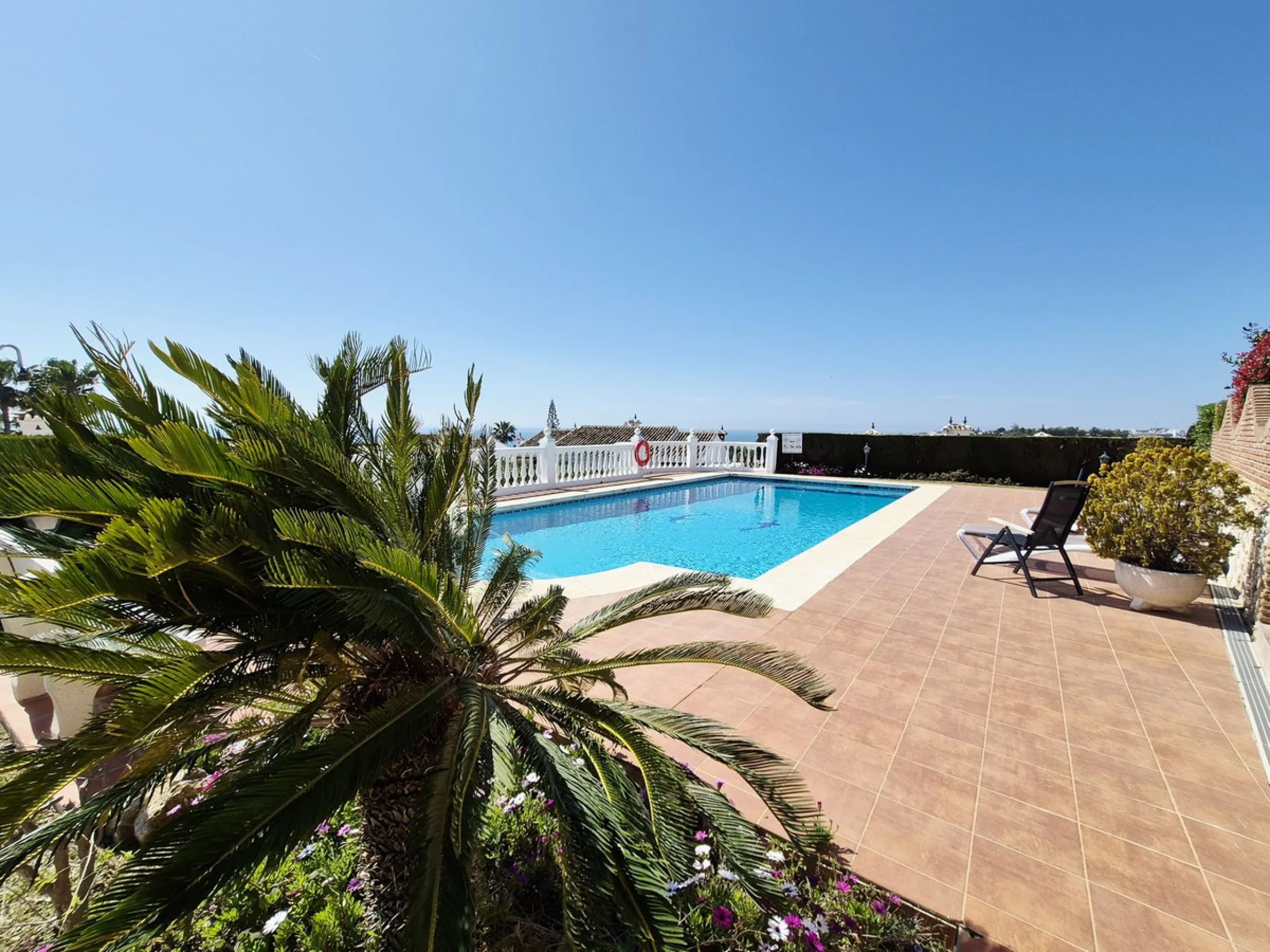 INCREDIBLE PANORAMIC VIEWS FROM THIS BRIGHT AND SPACIOUS APARTMENT WHICH LOOKS OUT OVER THE BAY OF LA CALA  AND EL CHAPARRAL GOLF COURSE.