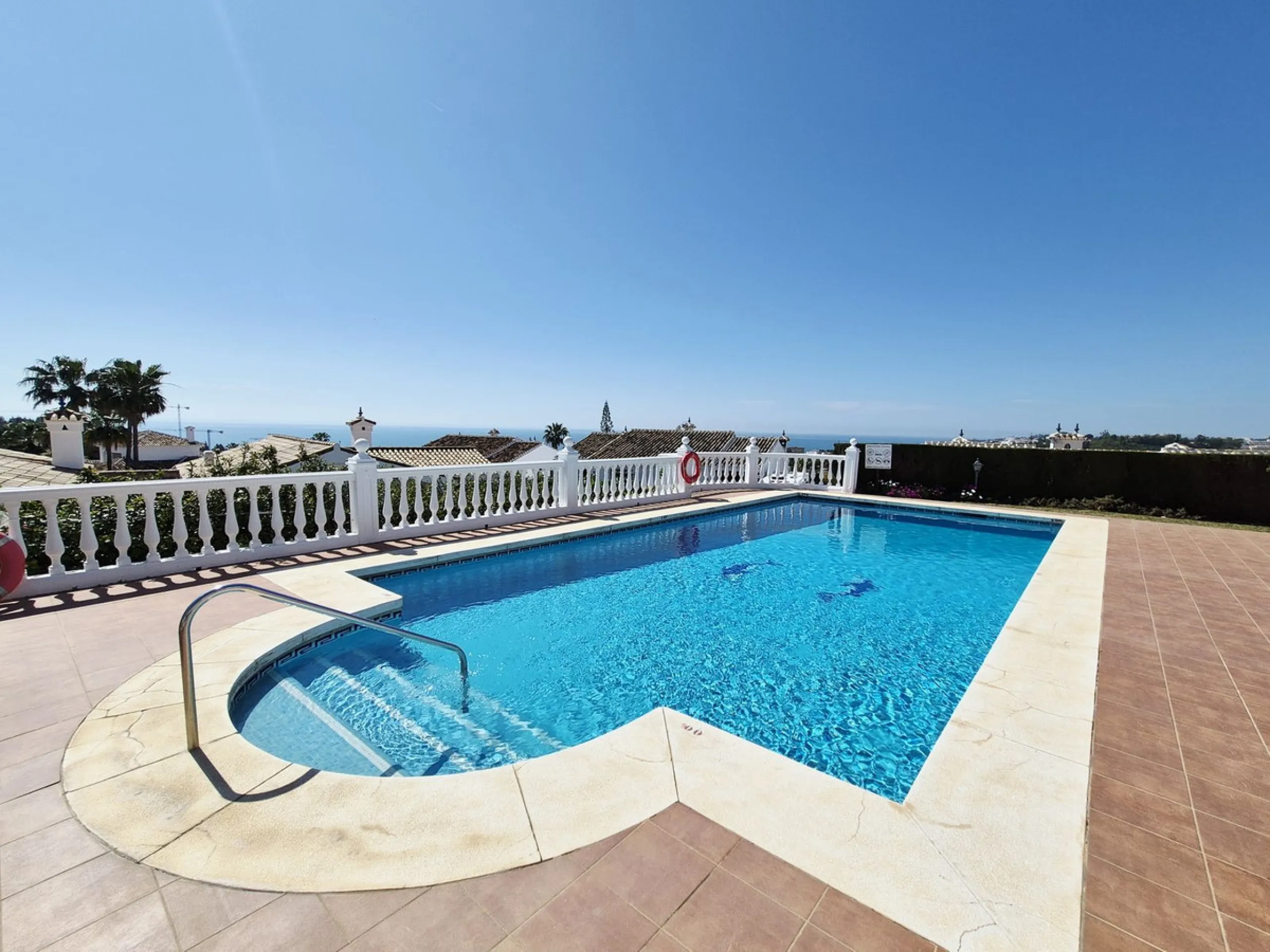 INCREDIBLE PANORAMIC VIEWS FROM THIS BRIGHT AND SPACIOUS APARTMENT WHICH LOOKS OUT OVER THE BAY OF LA CALA  AND EL CHAPARRAL GOLF COURSE.