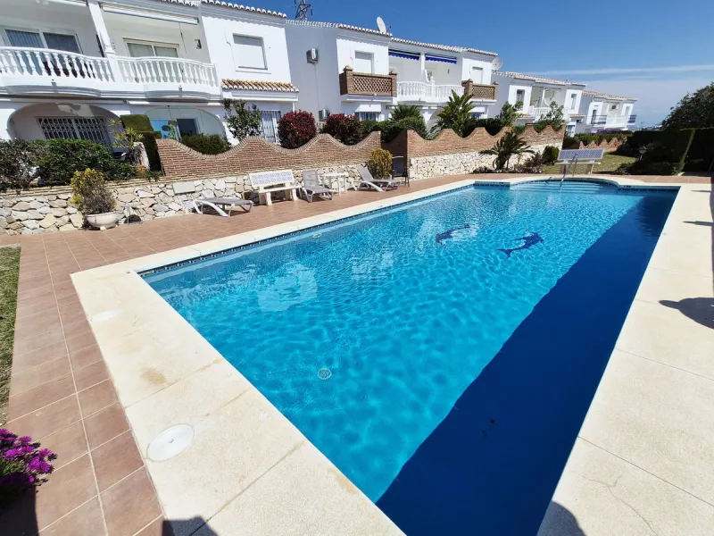 INCREDIBLE PANORAMIC VIEWS FROM THIS BRIGHT AND SPACIOUS APARTMENT WHICH LOOKS OUT OVER THE BAY OF LA CALA  AND EL CHAPARRAL GOLF COURSE.