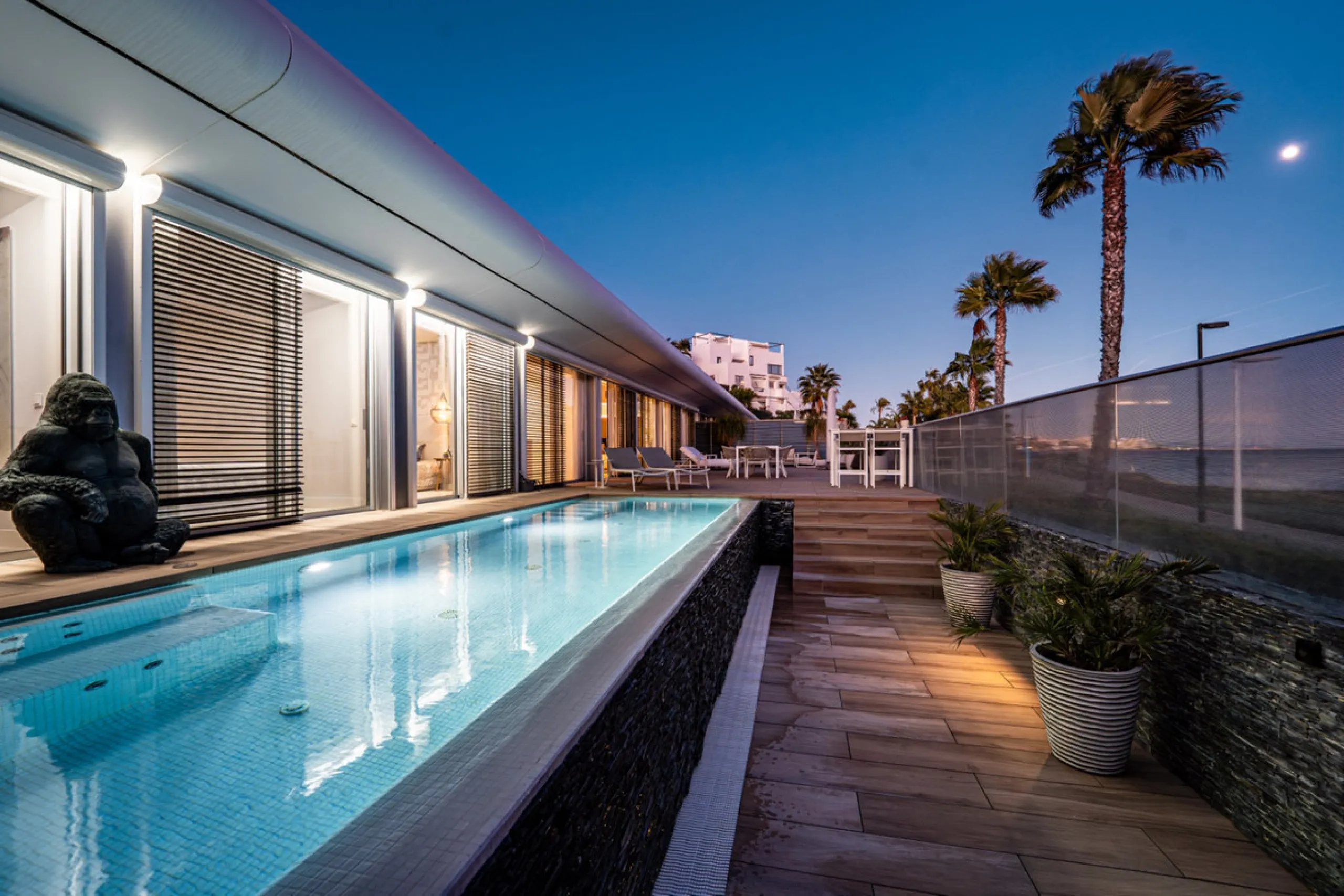Casa Azul is a modern 4-bed, 3-bath beachfront villa in an exclusive gated complex in Estepona. The home offers open plan living and a bright interior with large windows. You have a private pool, an expansive terrace and direct beach access. The villa sit