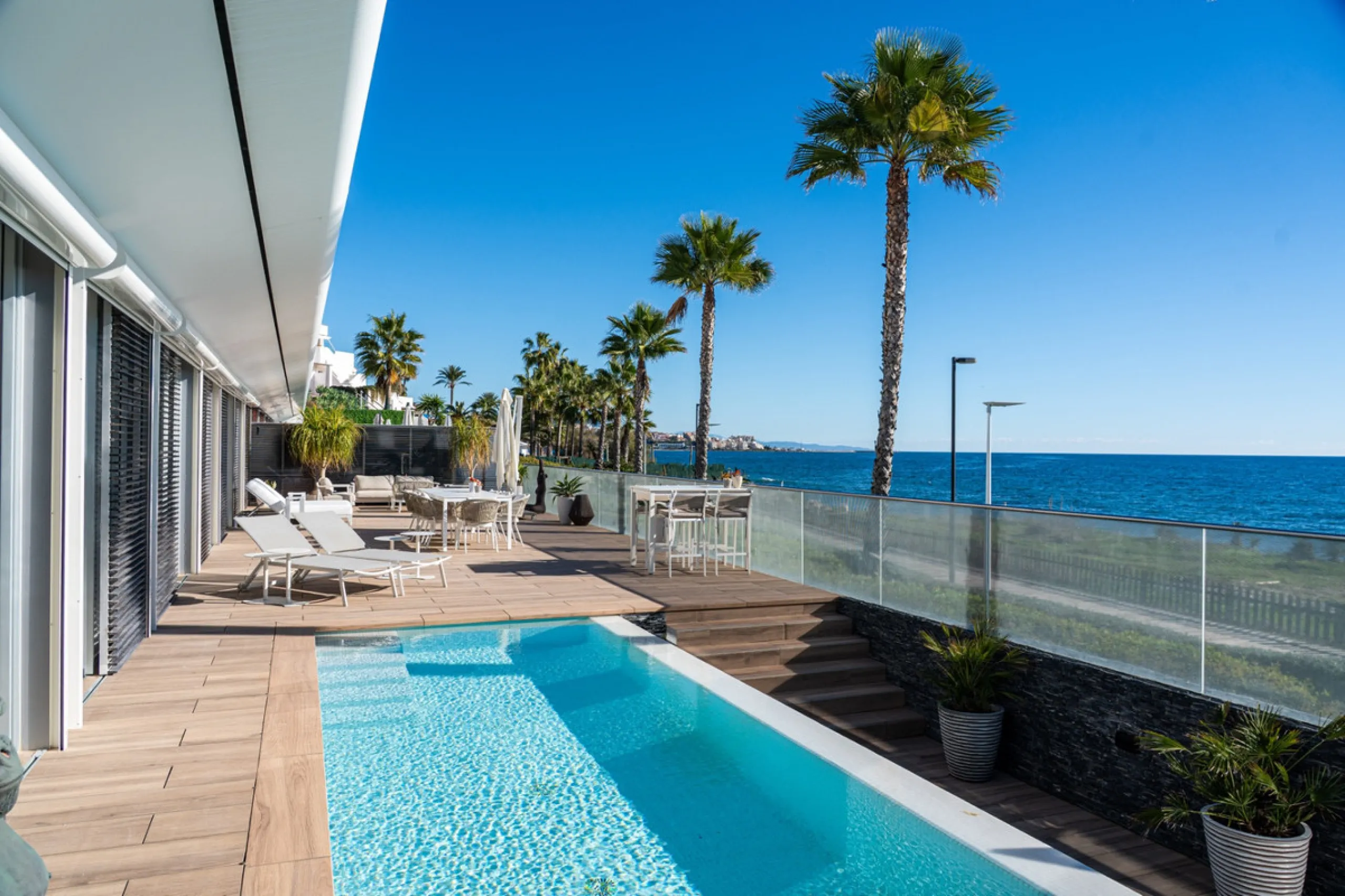 Casa Azul is a modern 4-bed, 3-bath beachfront villa in an exclusive gated complex in Estepona. The home offers open plan living and a bright interior with large windows. You have a private pool, an expansive terrace and direct beach access. The villa sit