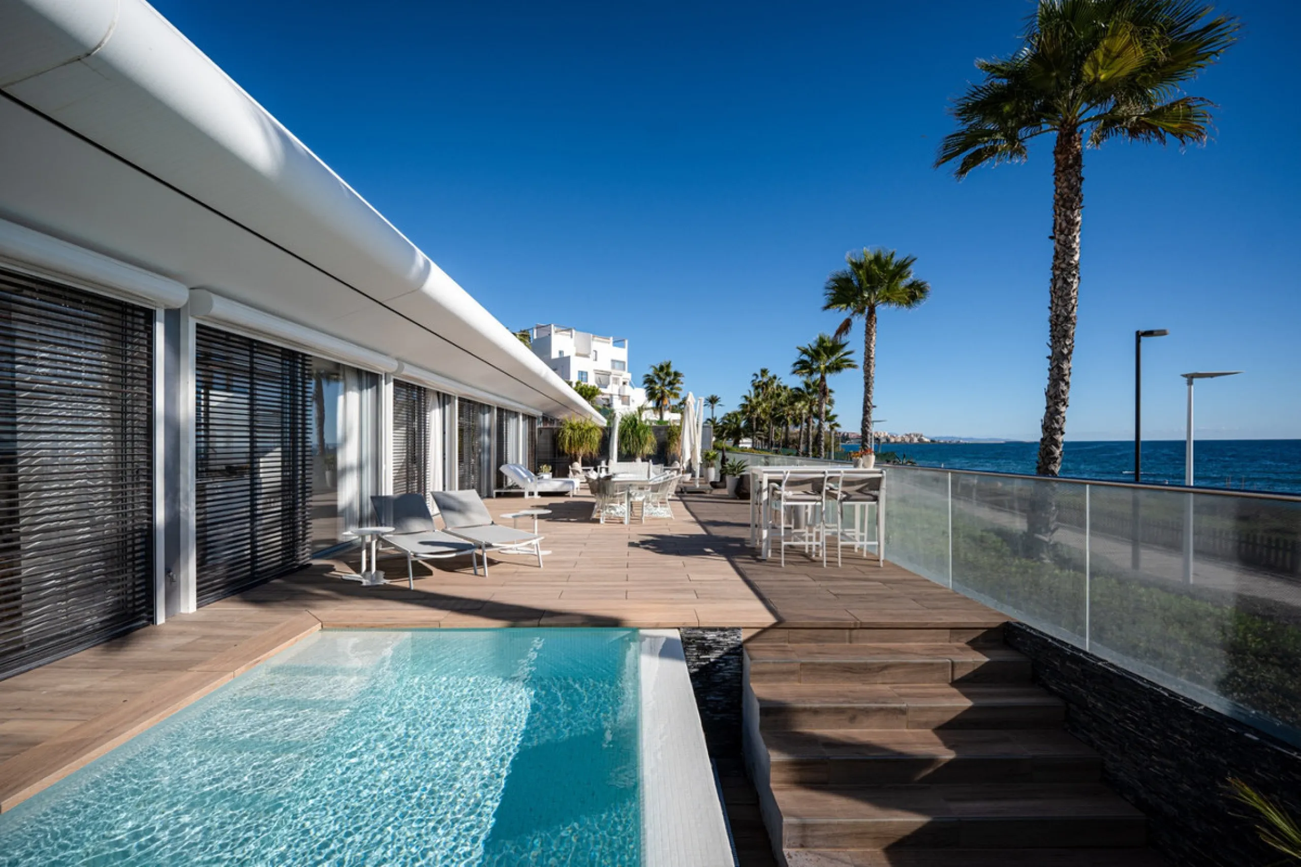 Casa Azul is a modern 4-bed, 3-bath beachfront villa in an exclusive gated complex in Estepona. The home offers open plan living and a bright interior with large windows. You have a private pool, an expansive terrace and direct beach access. The villa sit