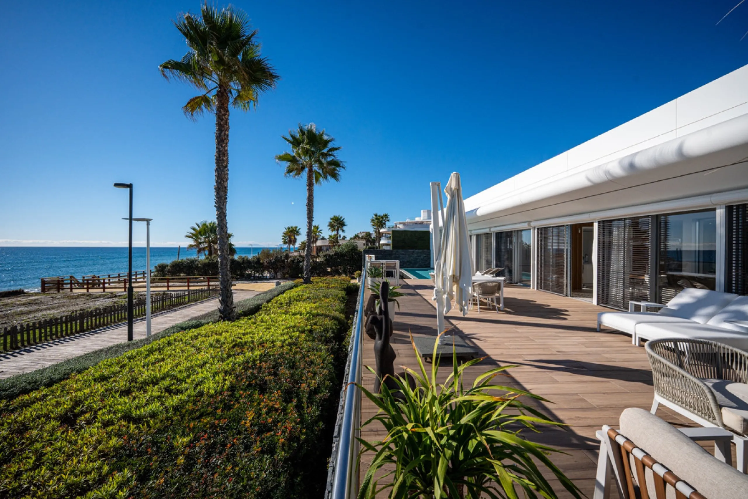 Casa Azul is a modern 4-bed, 3-bath beachfront villa in an exclusive gated complex in Estepona. The home offers open plan living and a bright interior with large windows. You have a private pool, an expansive terrace and direct beach access. The villa sit