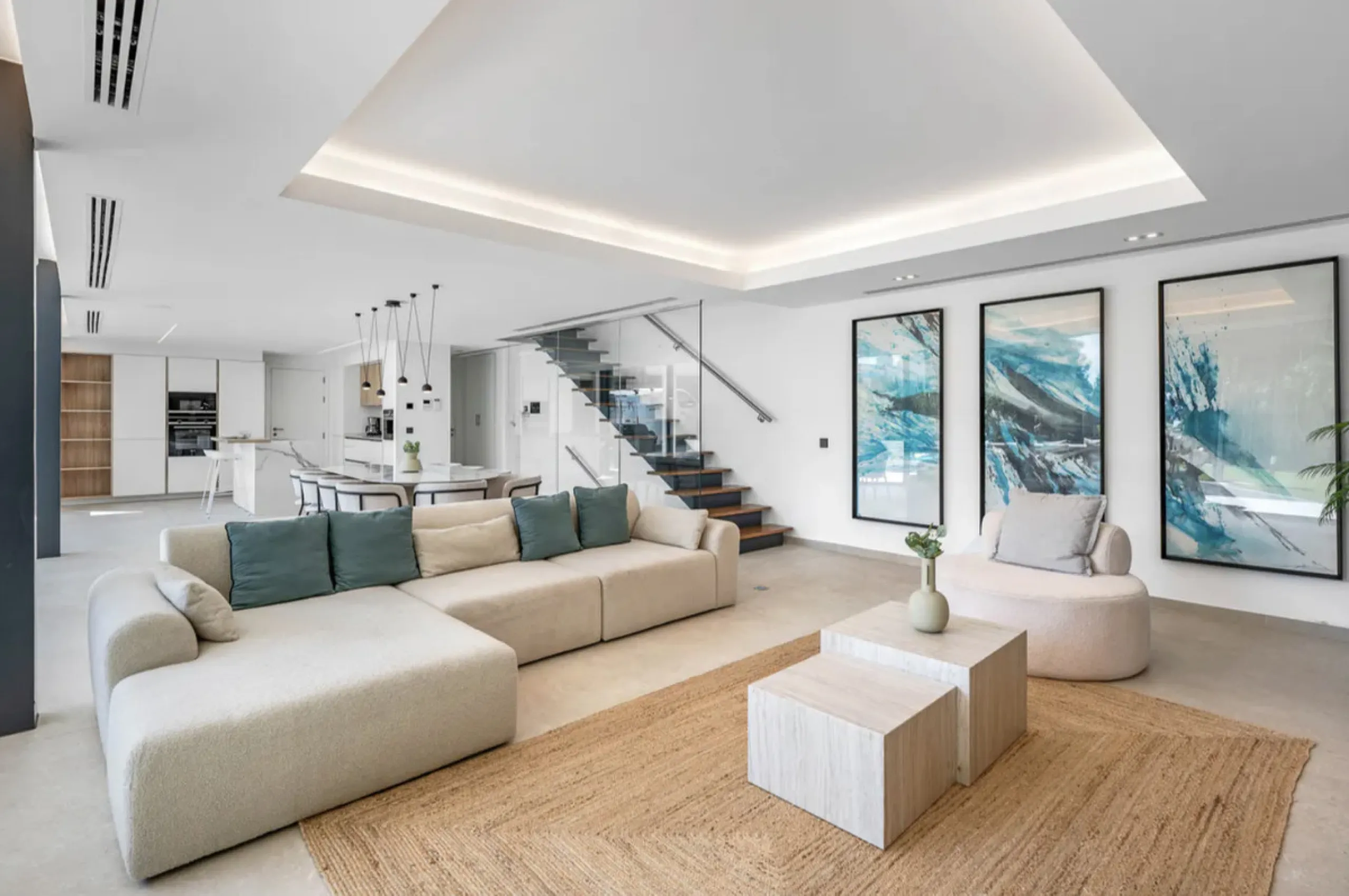 This stunning property is a modern luxury home in Reserva Marbella with open sea views and a bright open-plan design. The ground floor connects the kitchen, dining and living areas in one clean space that leads to a covered terrace, a landscaped garden an