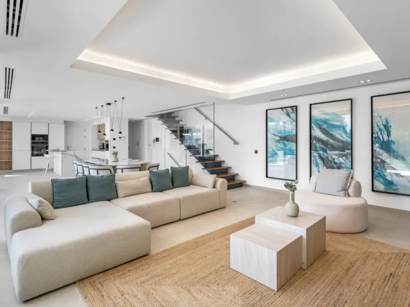 This stunning property is a modern luxury home in Reserva Marbella with open sea views and a bright open-plan design. The ground floor connects the kitchen, dining and living areas in one clean space that leads to a covered terrace, a landscaped garden an