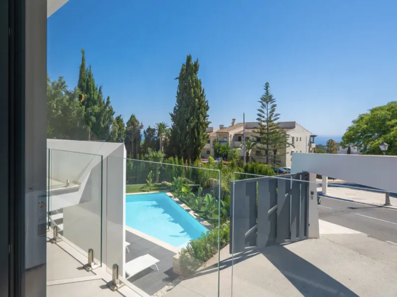 This stunning property is a modern luxury home in Reserva Marbella with open sea views and a bright open-plan design. The ground floor connects the kitchen, dining and living areas in one clean space that leads to a covered terrace, a landscaped garden an