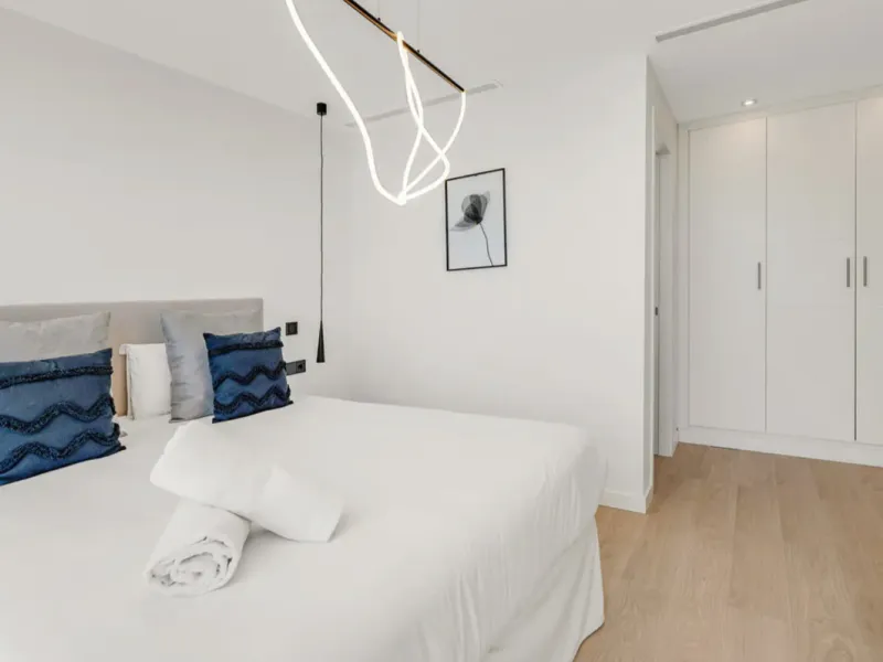 This stunning property is a modern luxury home in Reserva Marbella with open sea views and a bright open-plan design. The ground floor connects the kitchen, dining and living areas in one clean space that leads to a covered terrace, a landscaped garden an