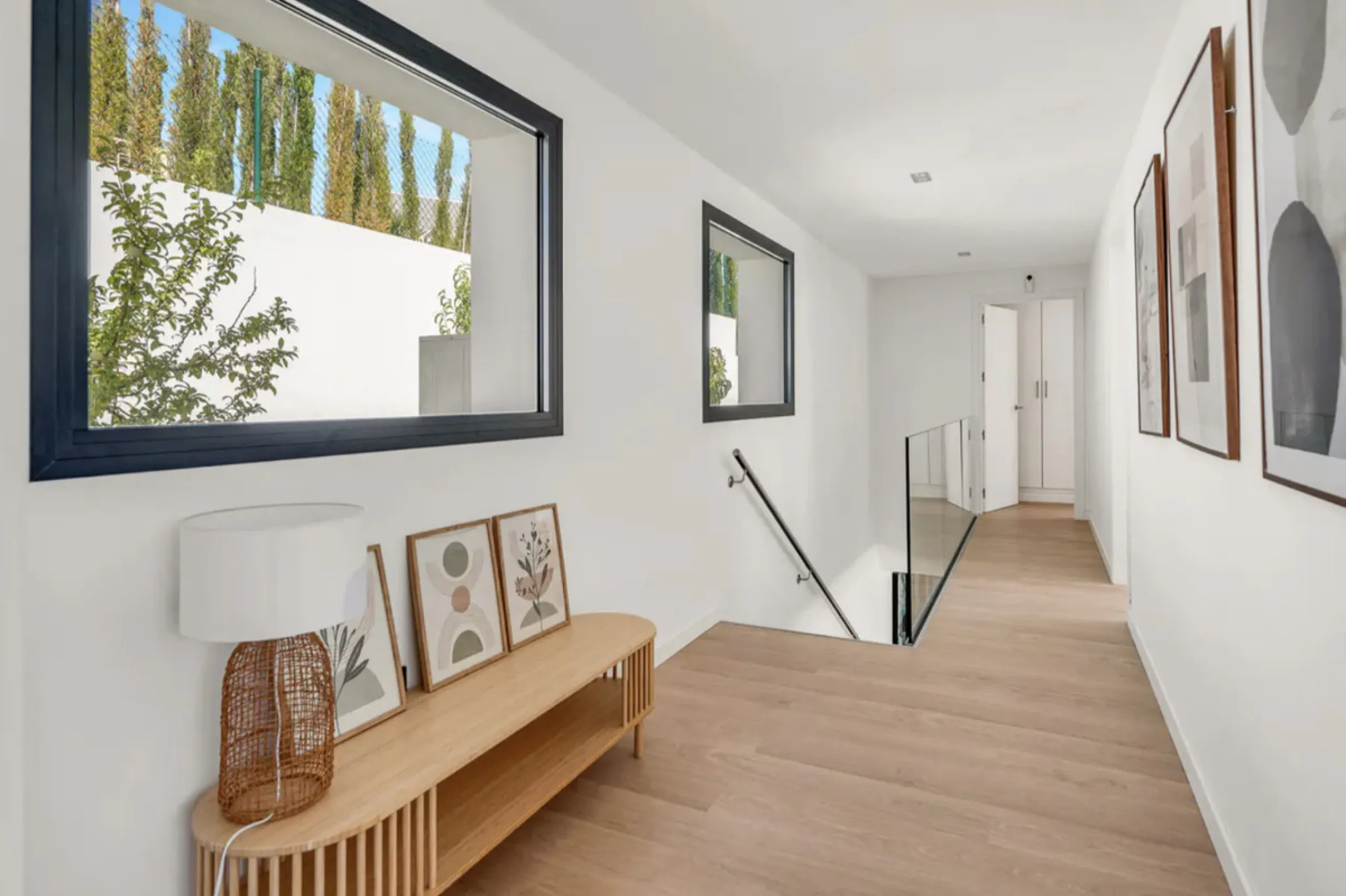 This stunning property is a modern luxury home in Reserva Marbella with open sea views and a bright open-plan design. The ground floor connects the kitchen, dining and living areas in one clean space that leads to a covered terrace, a landscaped garden an