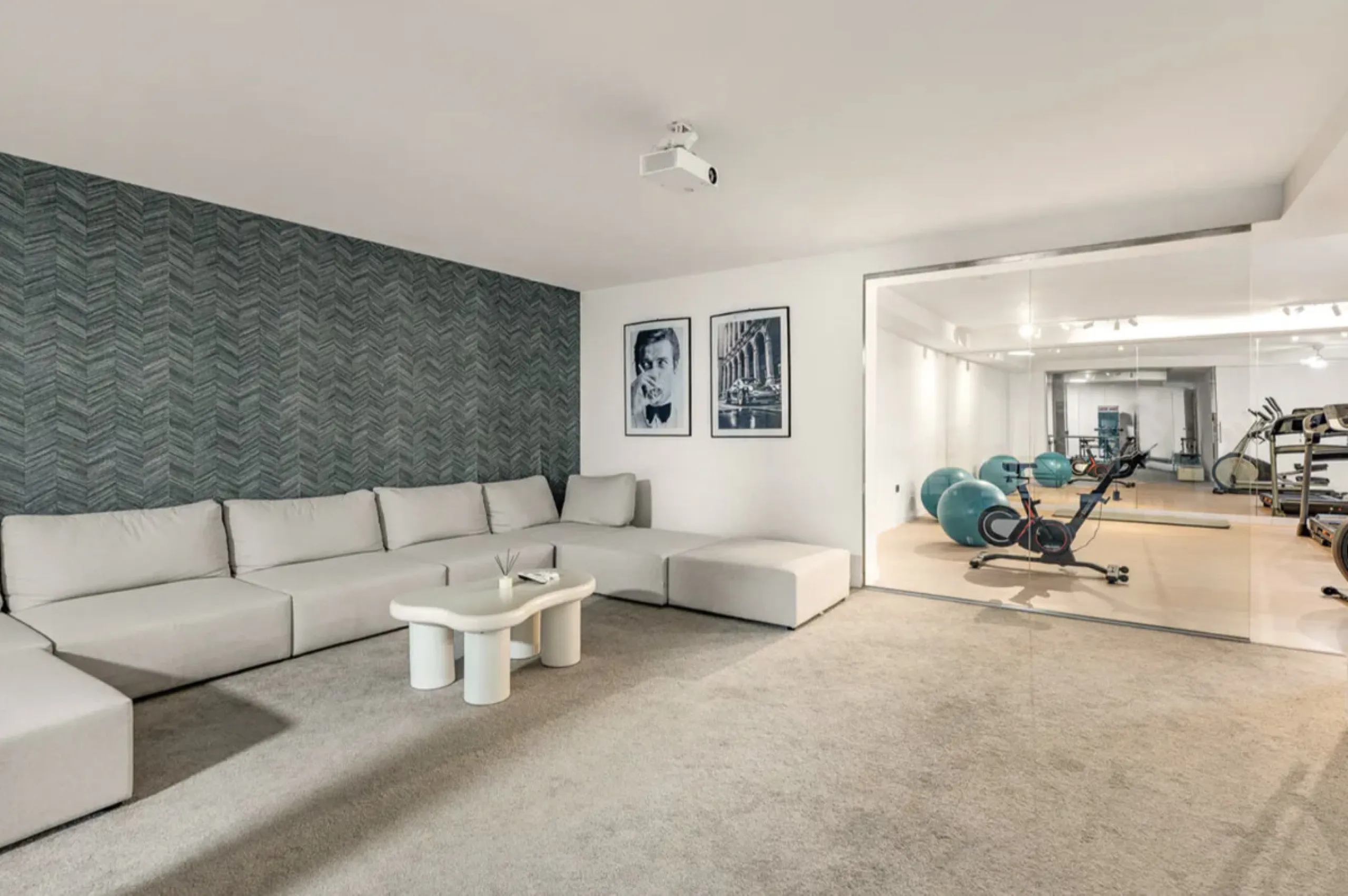This stunning property is a modern luxury home in Reserva Marbella with open sea views and a bright open-plan design. The ground floor connects the kitchen, dining and living areas in one clean space that leads to a covered terrace, a landscaped garden an